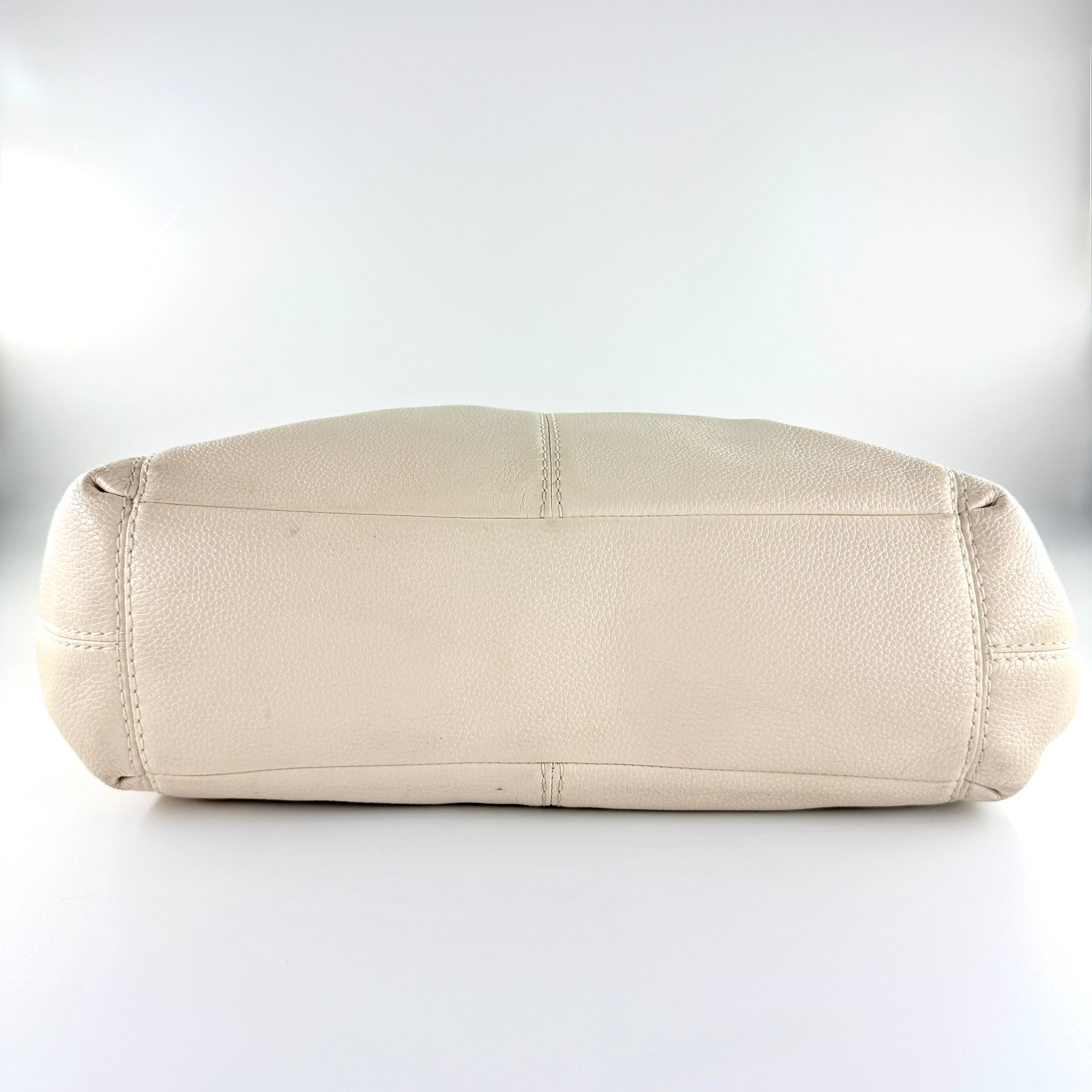 Coach Lexy Stardust Studded Chalk Hobo in ivory pebbled leather, adorned with mixed metal studs and dual handles.