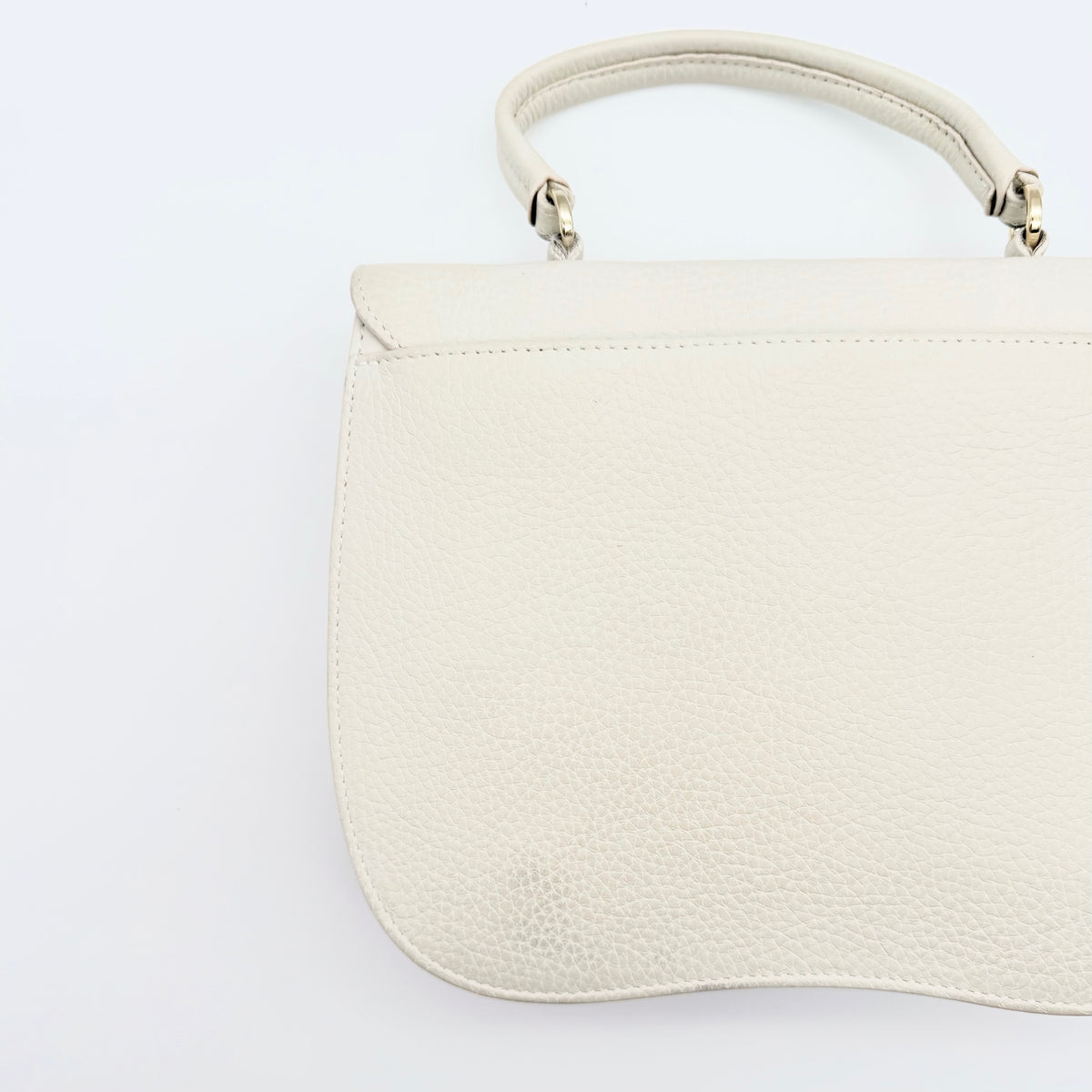Furla 2Way Ducale Mini Handbag in creamy white leather with gold hardware, top handle, and detachable strap displayed flat with authenticity card.