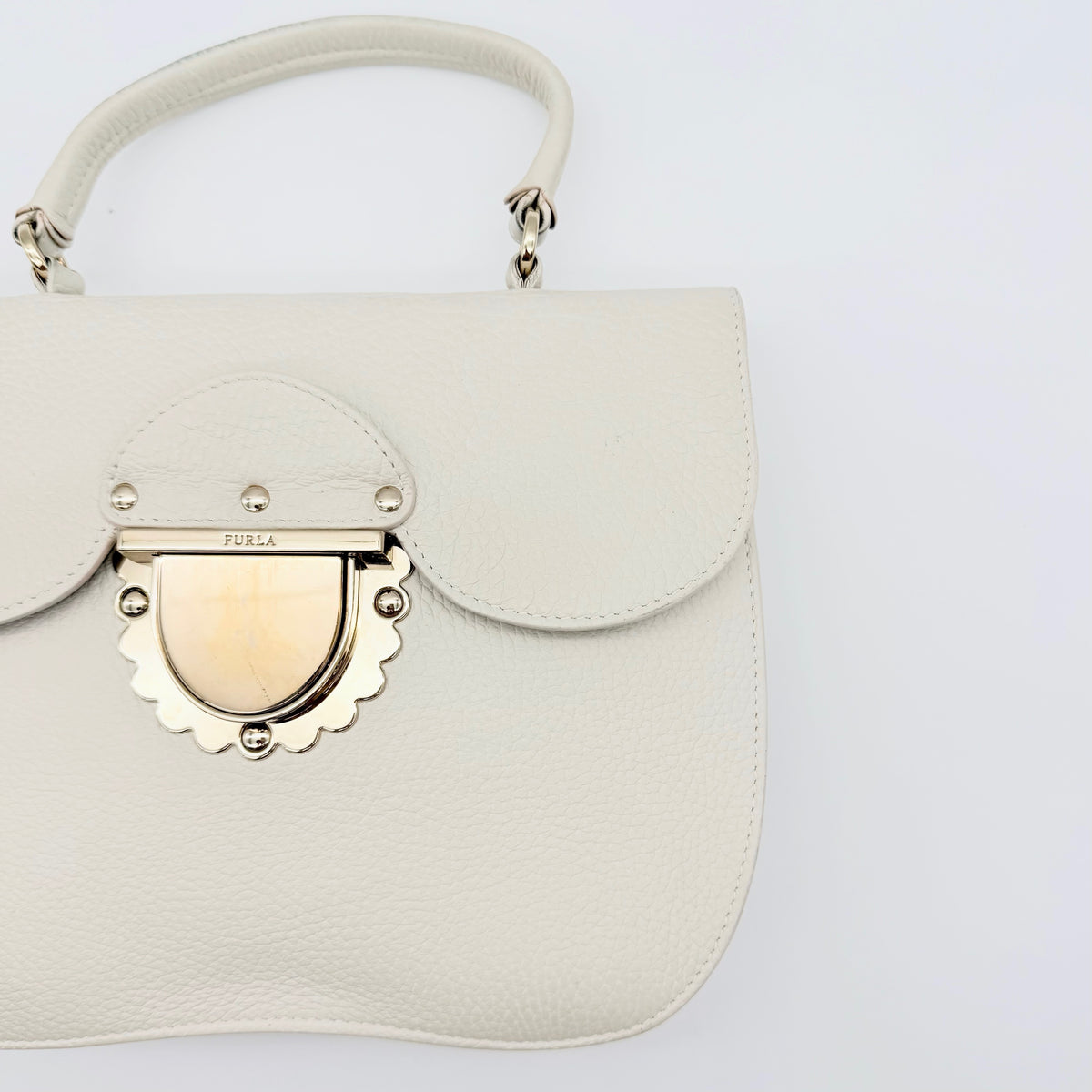 Furla 2Way Ducale Mini Handbag in creamy white leather with gold hardware, top handle, and detachable strap displayed flat with authenticity card.