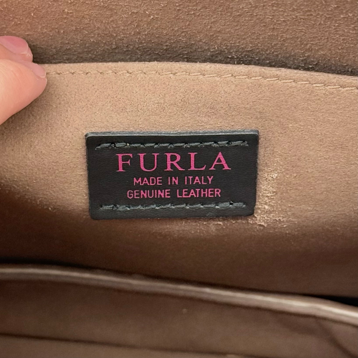 Furla 2Way Ducale Mini Handbag in creamy white leather with gold hardware, top handle, and detachable strap displayed flat with authenticity card.