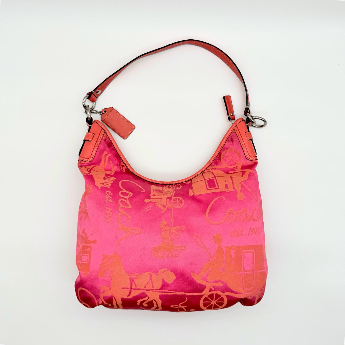 Coach pink and orange Horse & Carriage sateen hobo shoulder bag with detachable strap and leather trim.
