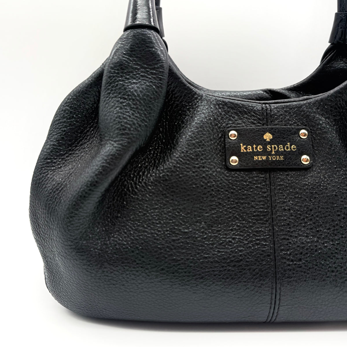 Kate Spade New York Stevie Berkshire Road Shoulder Bag in black pebbled leather with gold-tone hardware and double top handles.