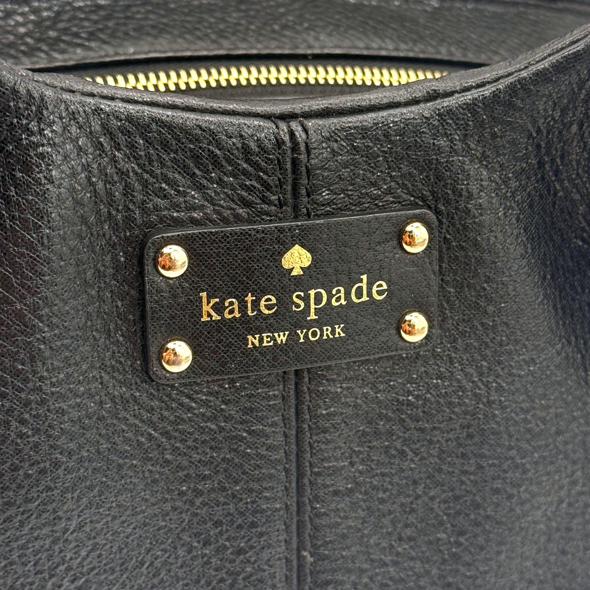 Kate Spade New York Stevie Berkshire Road Shoulder Bag in black pebbled leather with gold-tone hardware and double top handles.