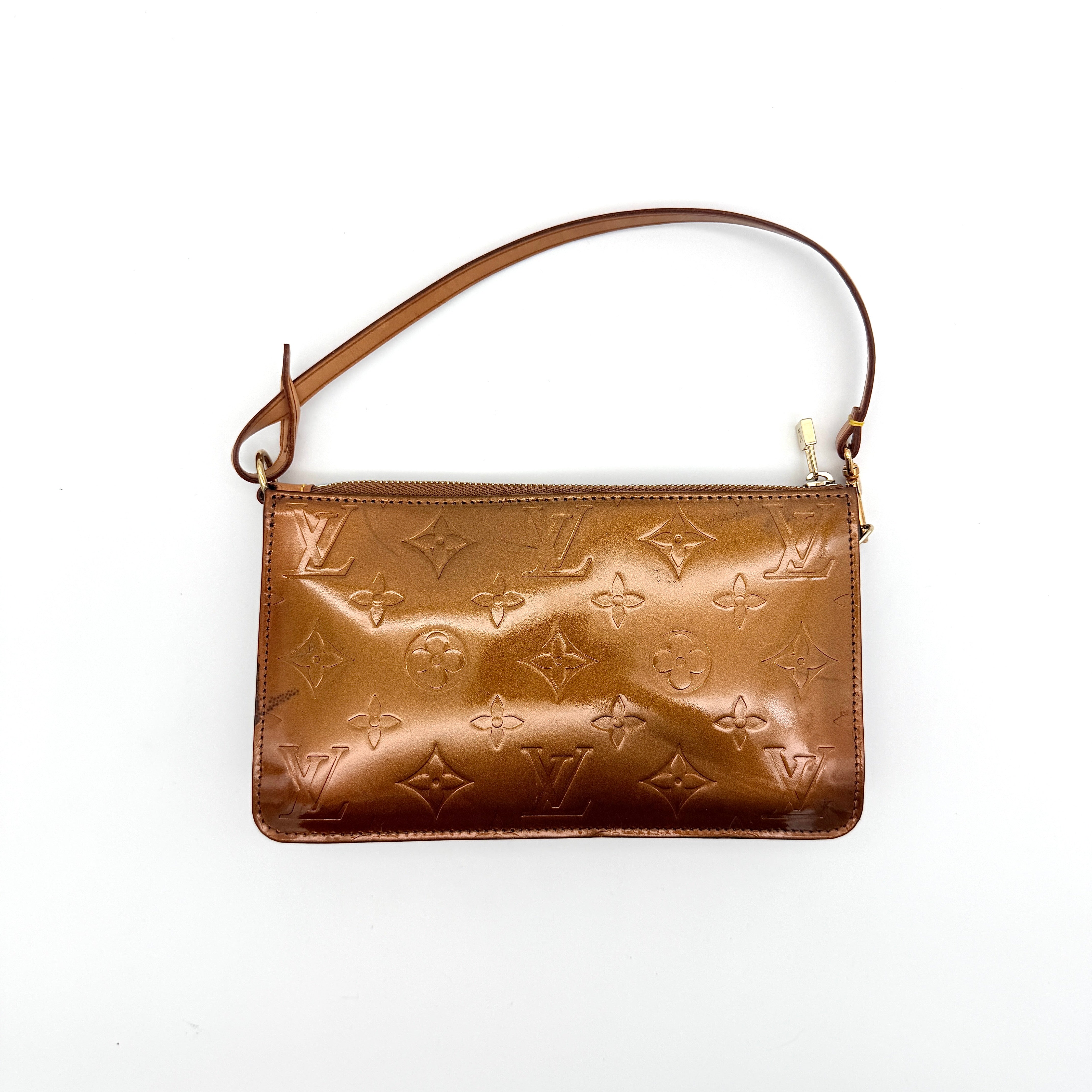 Louis Vuitton Monogram Lexington Vernis Pochette in bronze patent leather, shown with its gold-tone hardware and monogram embossing.
