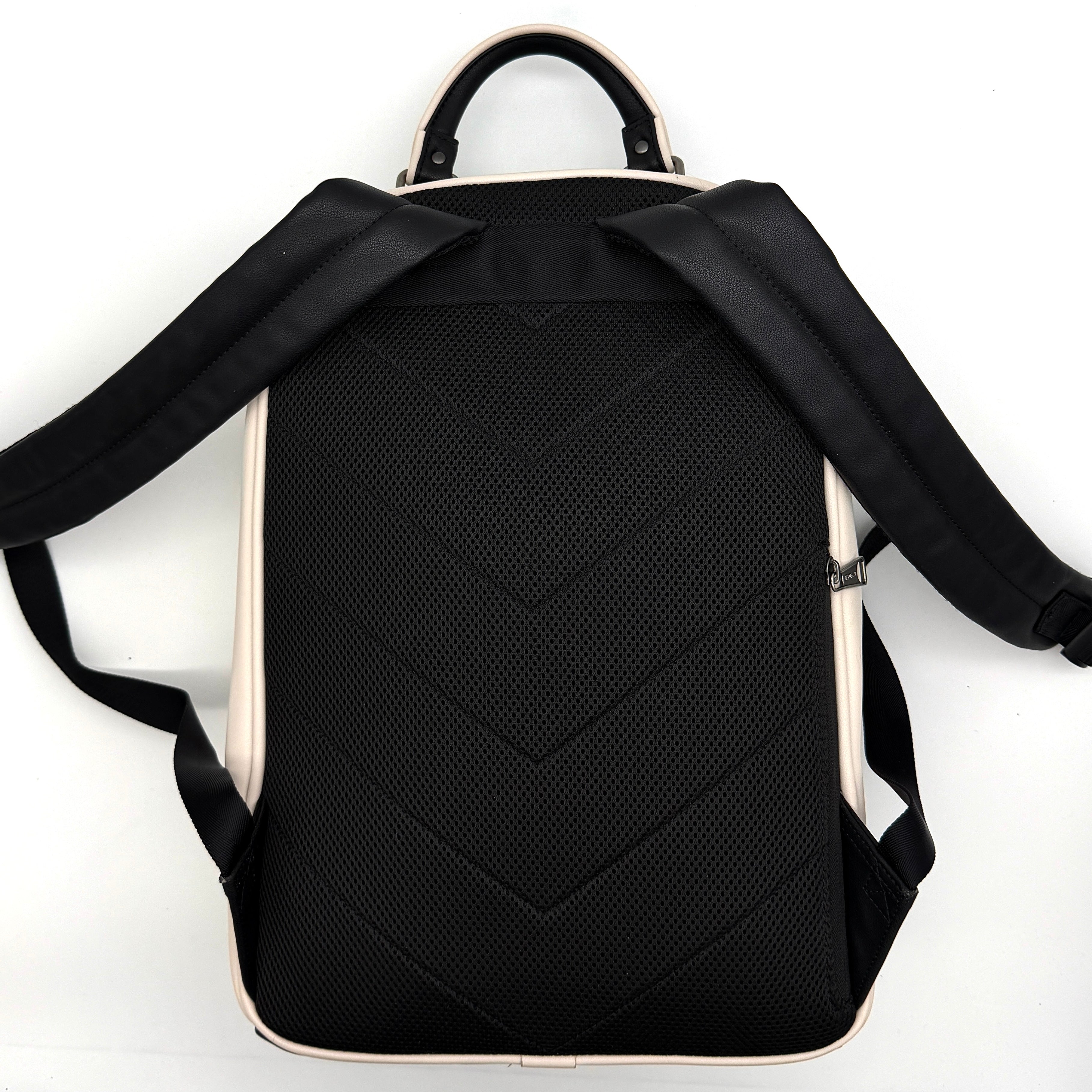 Diesel D-Logo Colorblock Backpack in black and white faux leather with a red logo patch and silver-tone hardware.