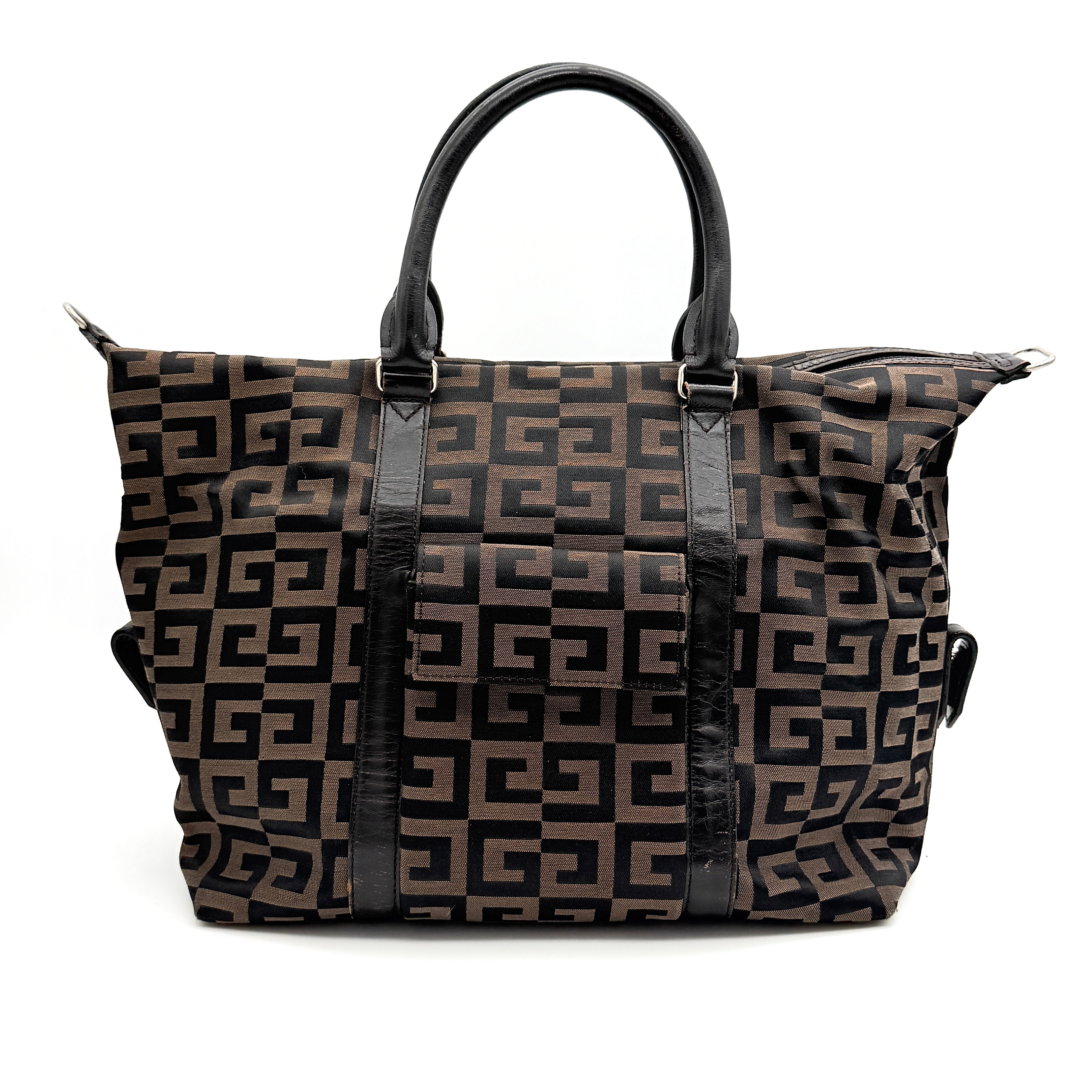 Givenchy 4G Monogram Handbag in brown and black fabric with leather handles and bold graphic pattern.