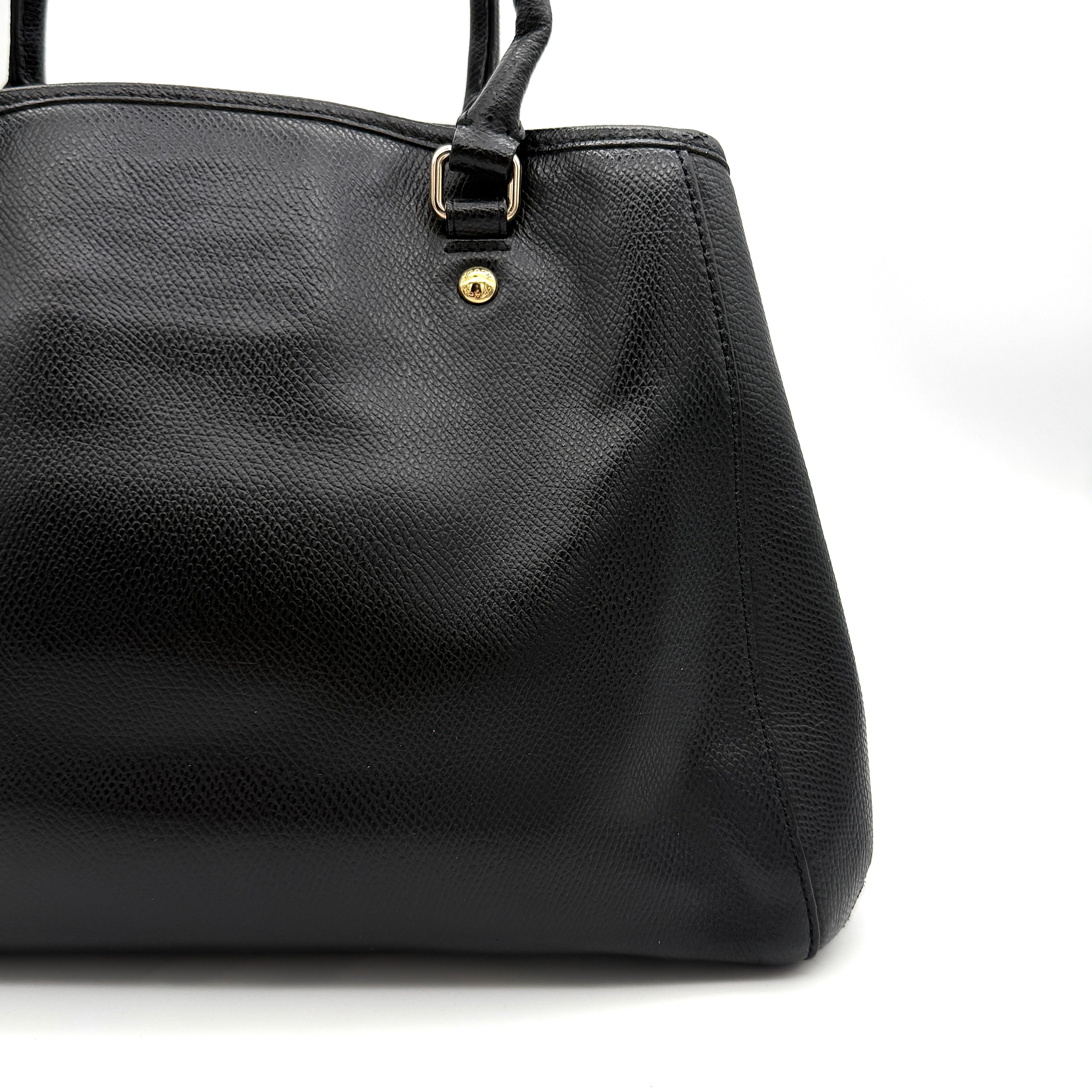 Coach 2Way Margot Carryall Handbag in black textured leather with gold-tone hardware and dual top handles, shown with detachable strap.