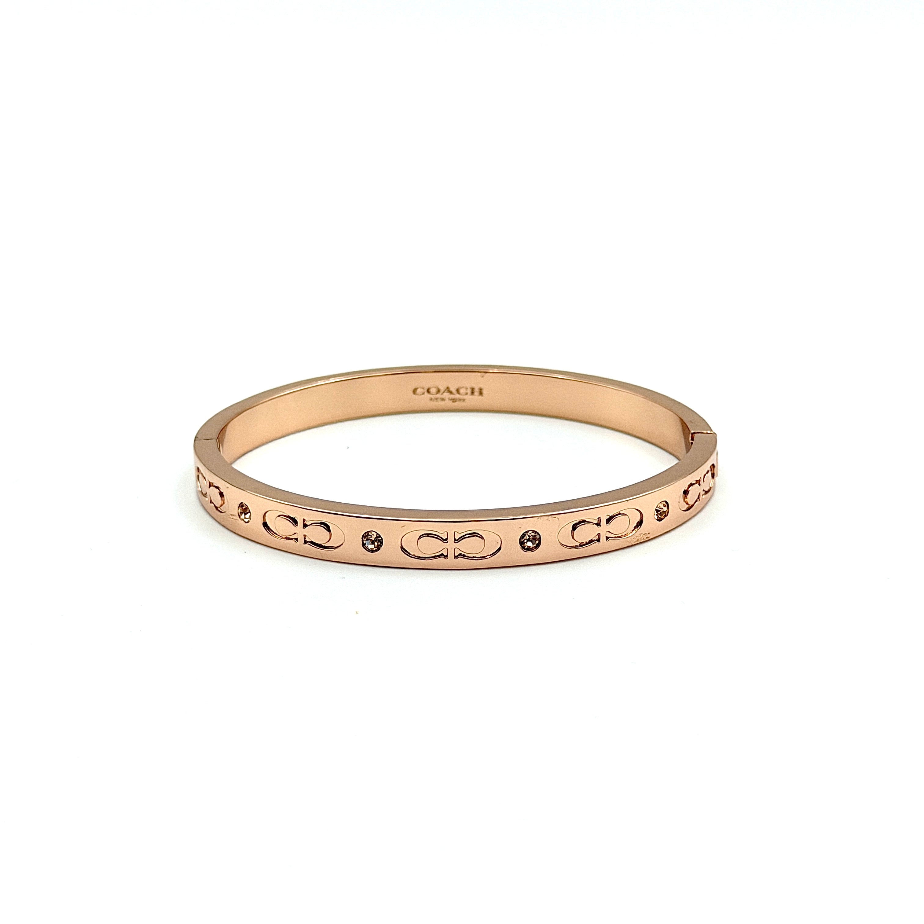 Coach Signature Kissing C Hinged Bangle Bracelet Rose Gold