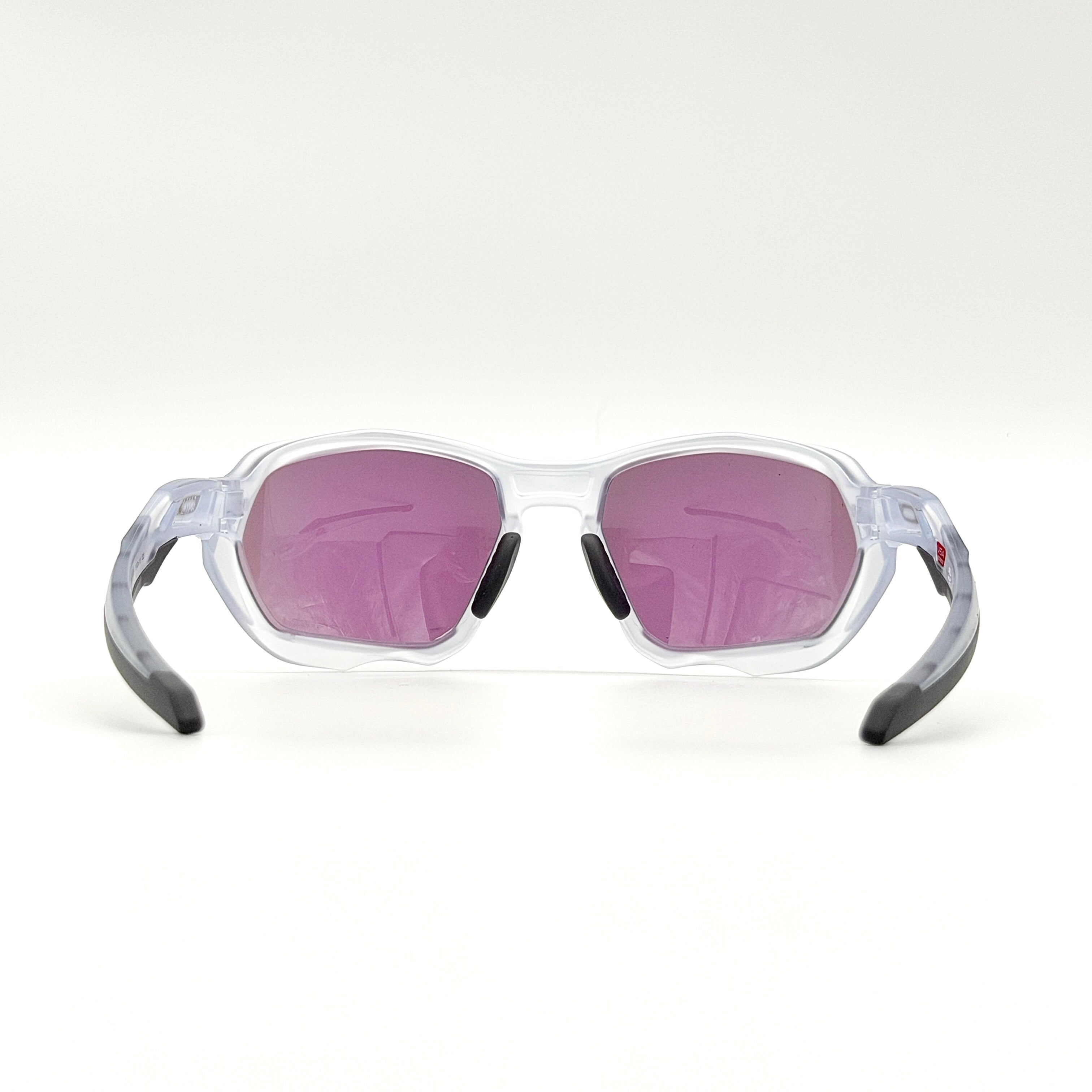 Oakley Plazma sunglasses in matte clear with Prizm Jade Road lenses, shown with original case and box.
