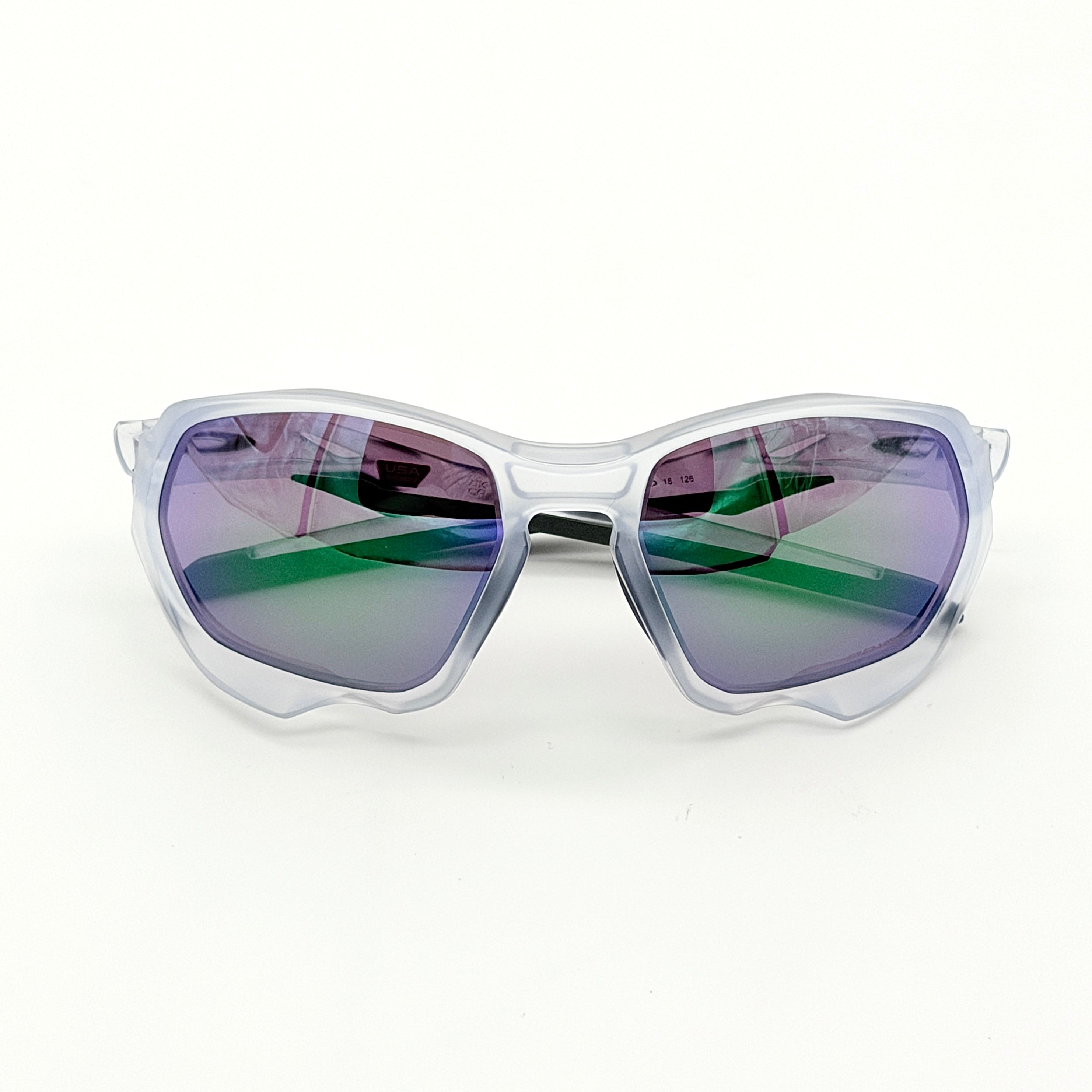 Oakley Plazma sunglasses in matte clear with Prizm Jade Road lenses, shown with original case and box.
