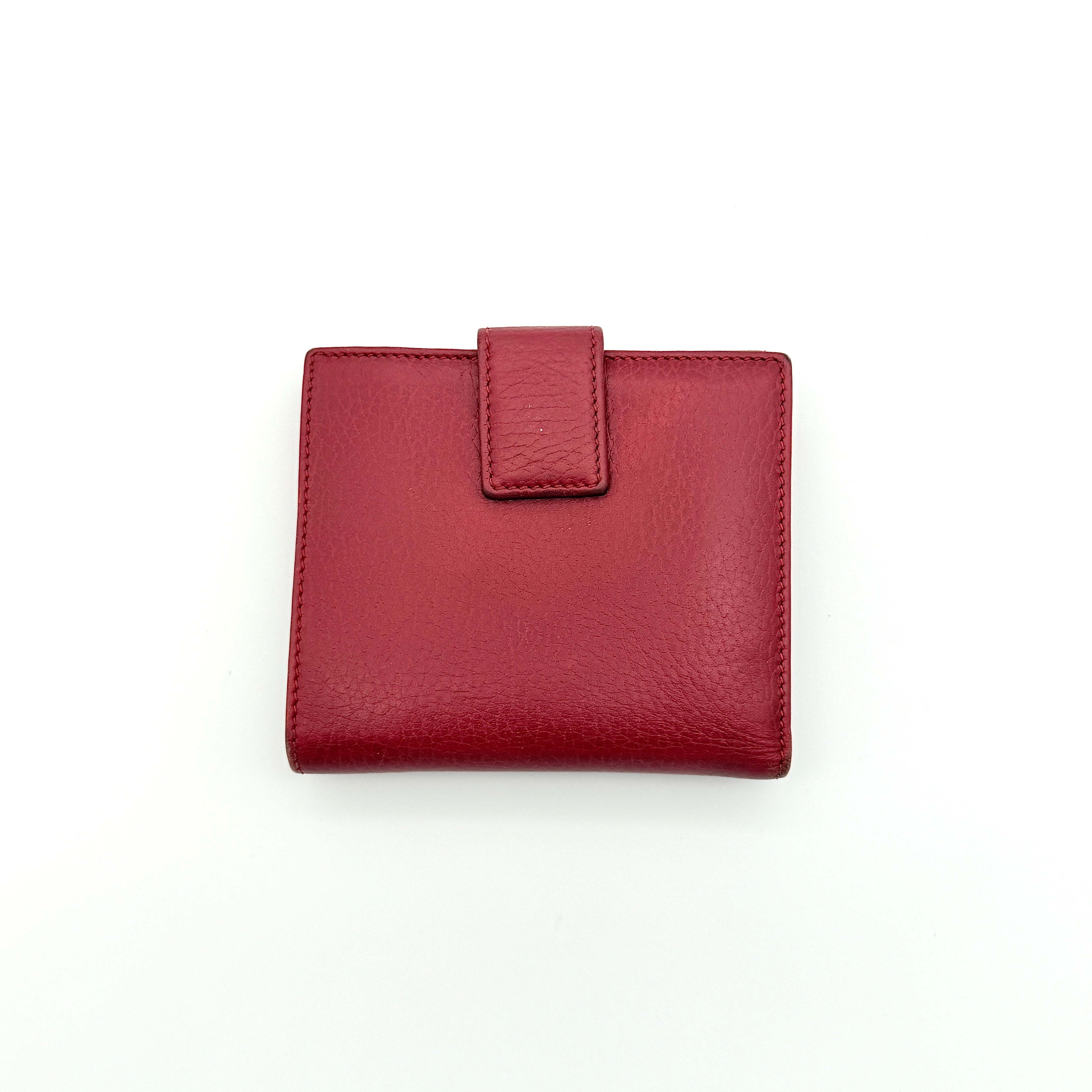 Gucci GG Marmont wallet in red grained leather with gold GG logo, presented with original box and dust bag.
