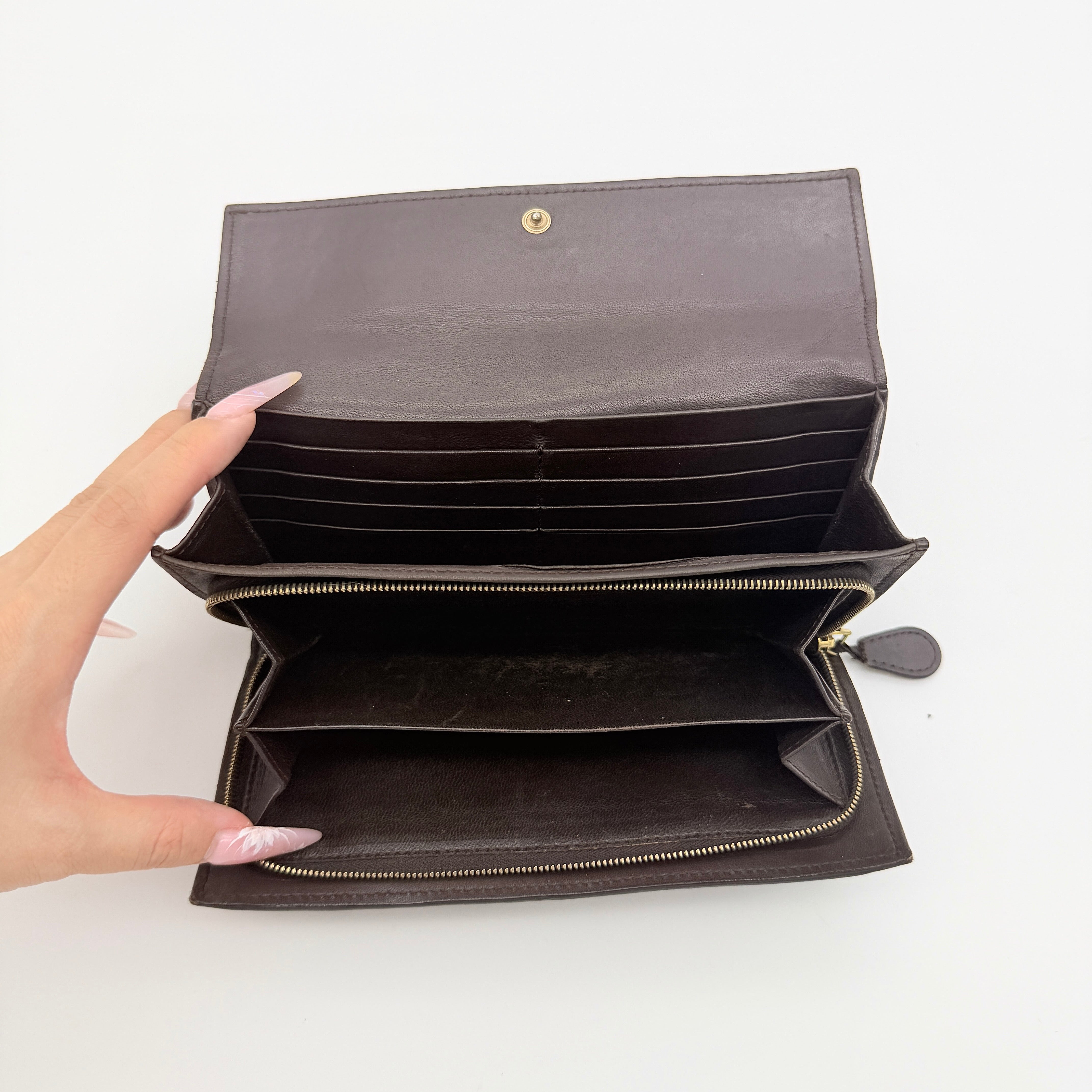 Bottega Veneta Intrecciato long wallet in dark brown leather with signature woven design