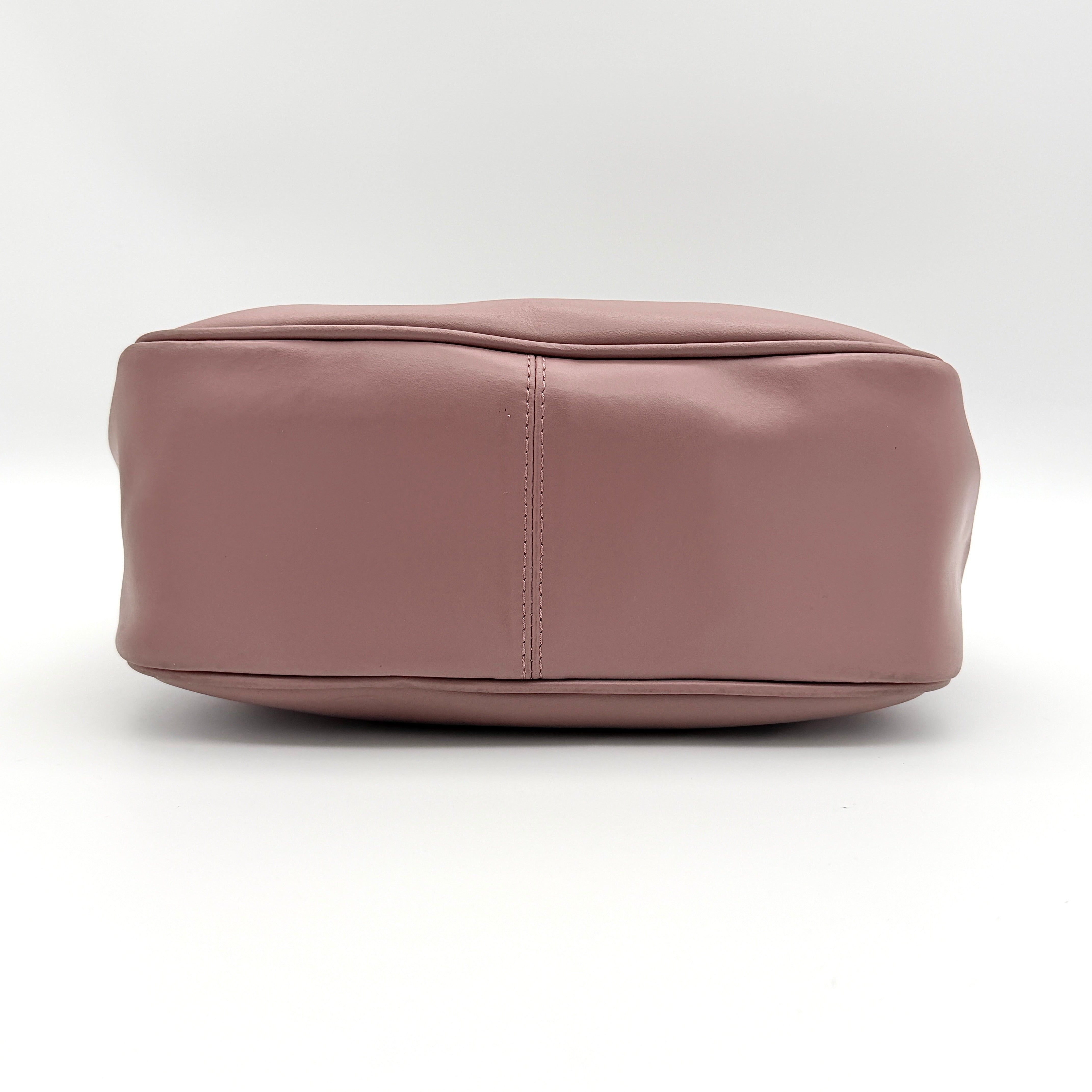Furla 2Way Leather Handbag in pink with top handles, gold-tone charm, and a detachable strap, photographed on a white background.