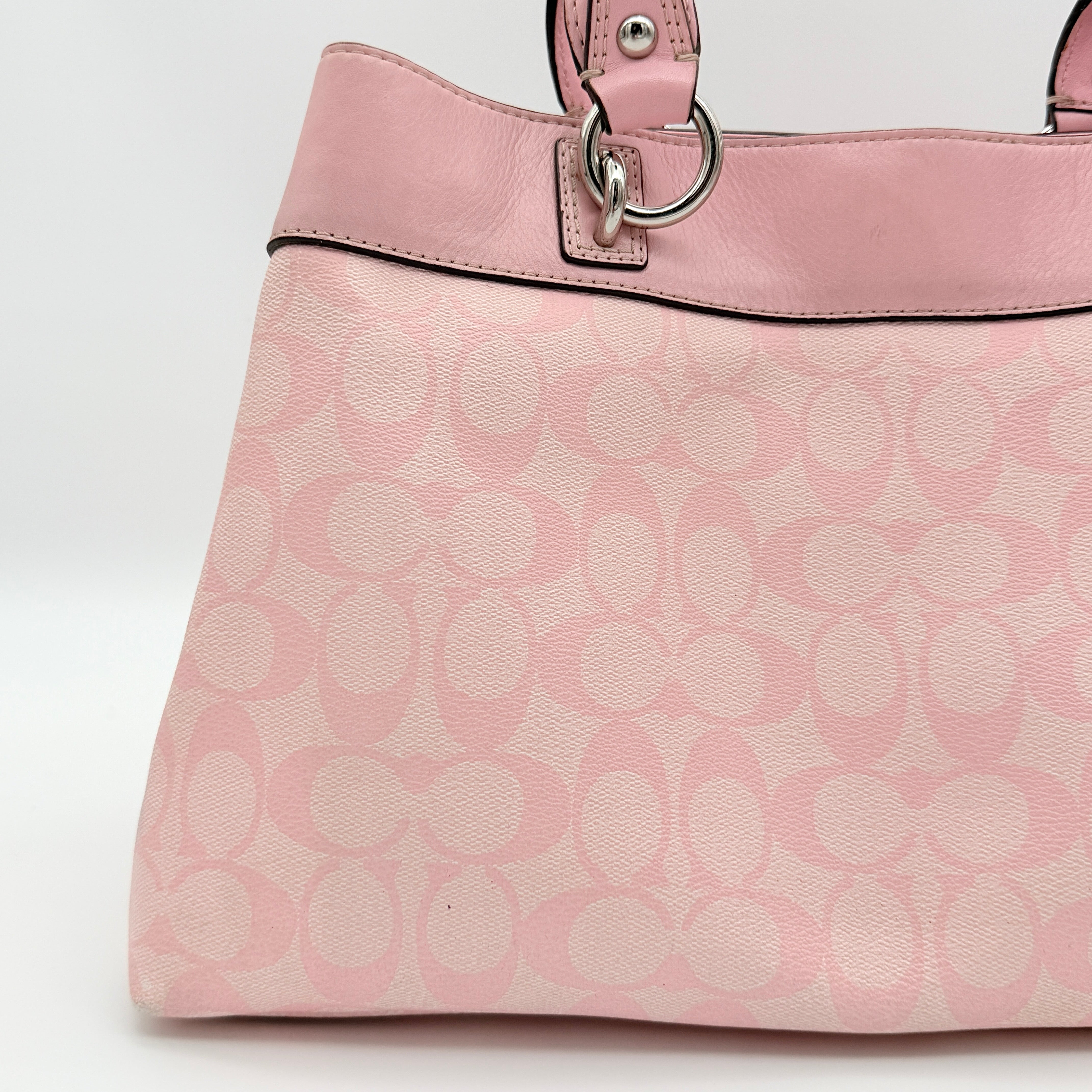 Coach Signature Penelope Shoulder Bag in pastel pink jacquard canvas with leather trim and silver-tone hardware.