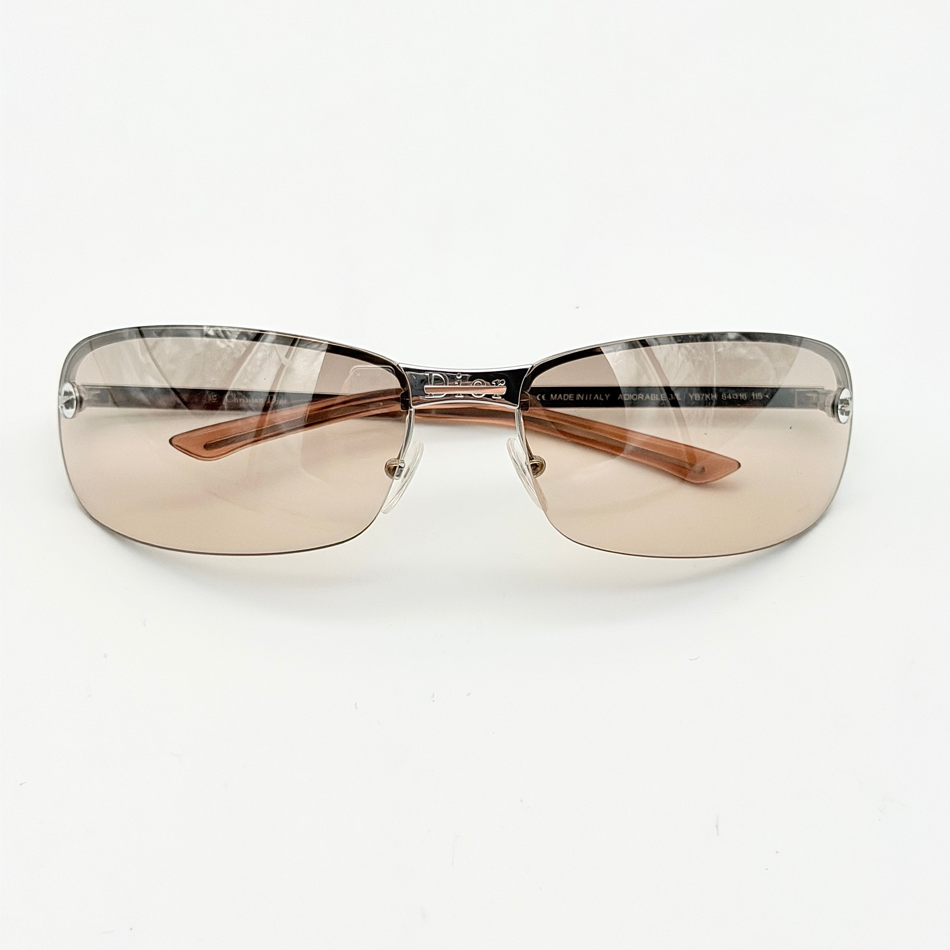 Dior Adiorable 3/L sunglasses in silver with brown gradient lenses, displayed in front of the Dior hard case.