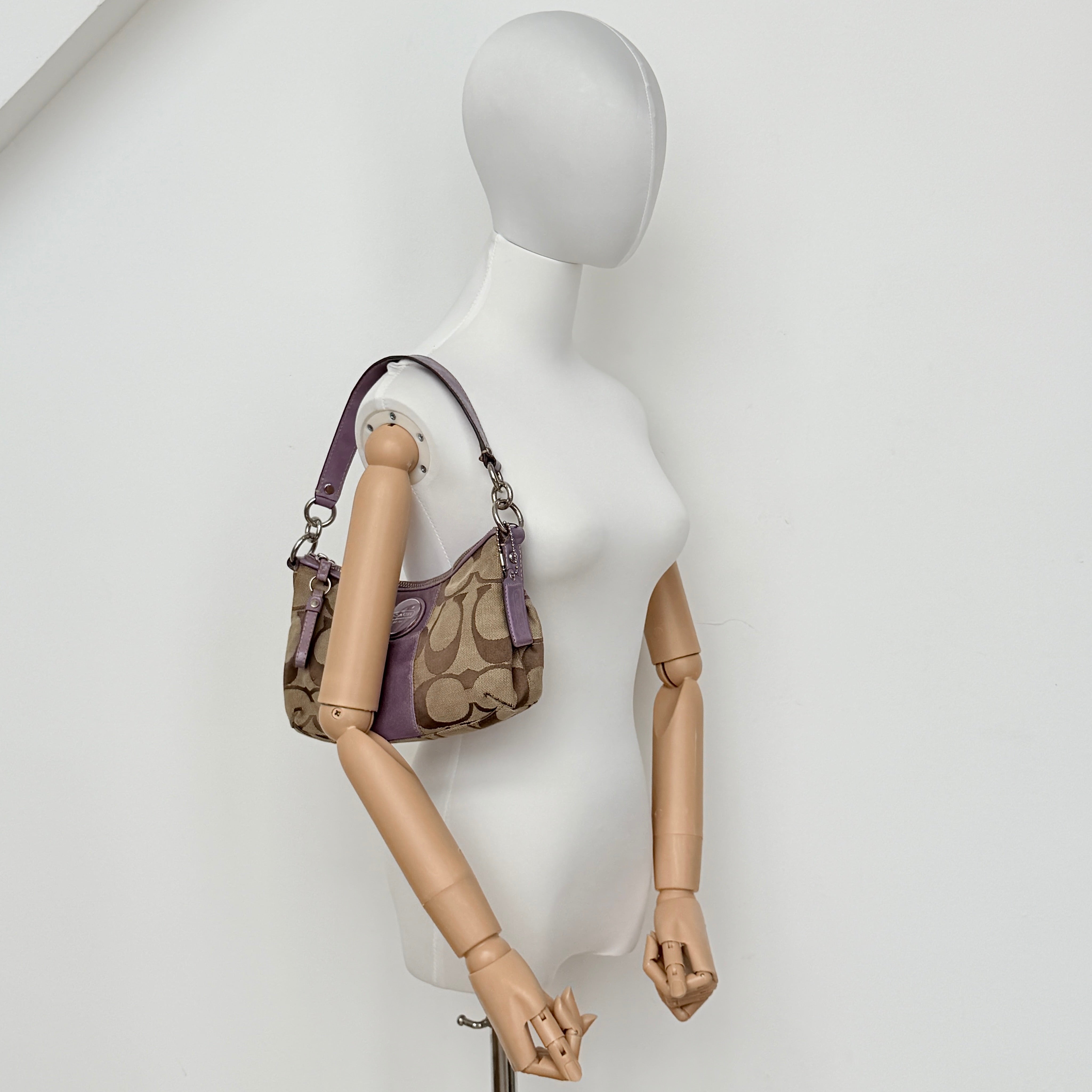 Coach 2Way Signature Shoulder Bag in beige jacquard with purple leather accents and silver hardware, shown with both short handle and detachable long strap.