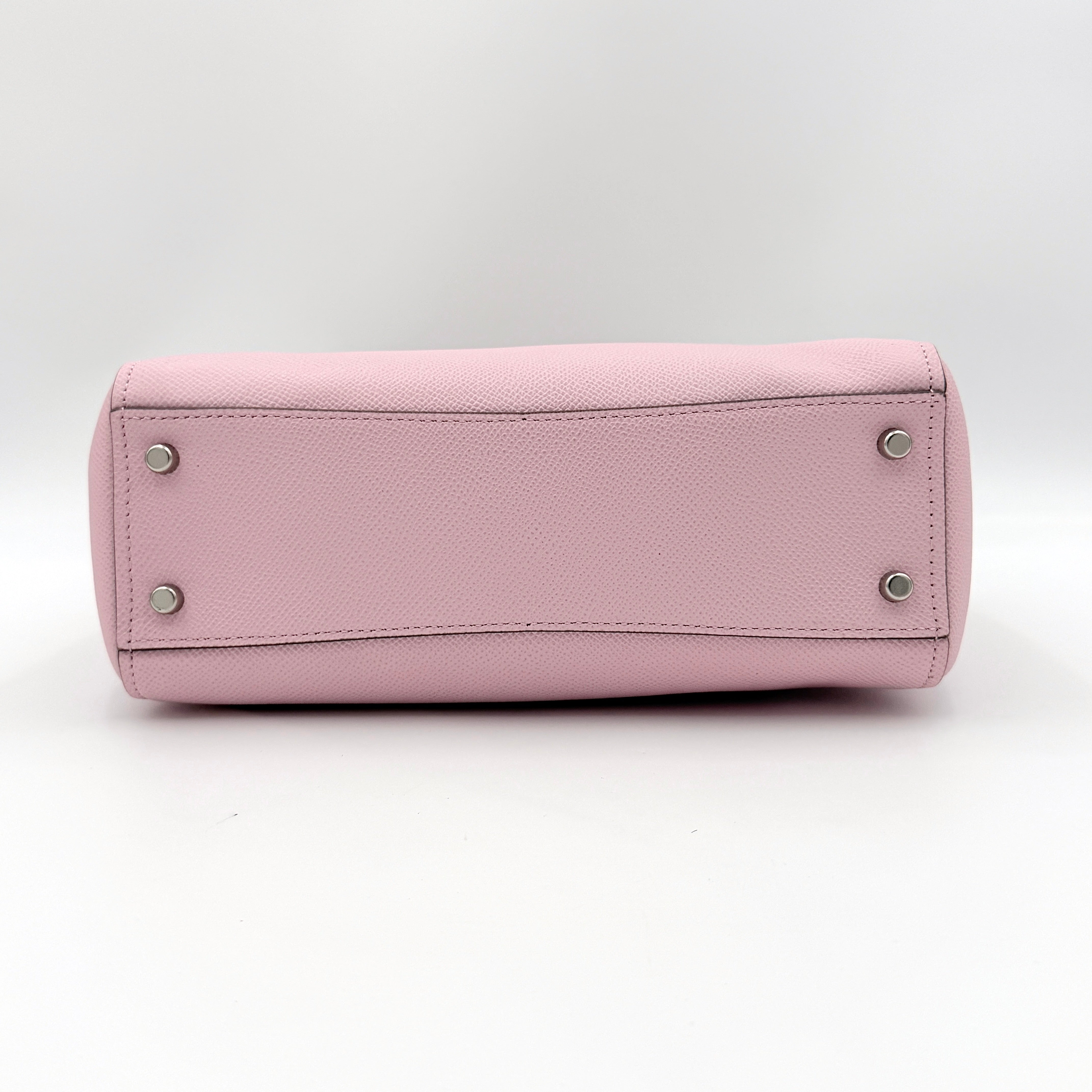 Coach Stanton 26 Carryall in blush pink grained leather with dual handles, silver hardware, and detachable strap.