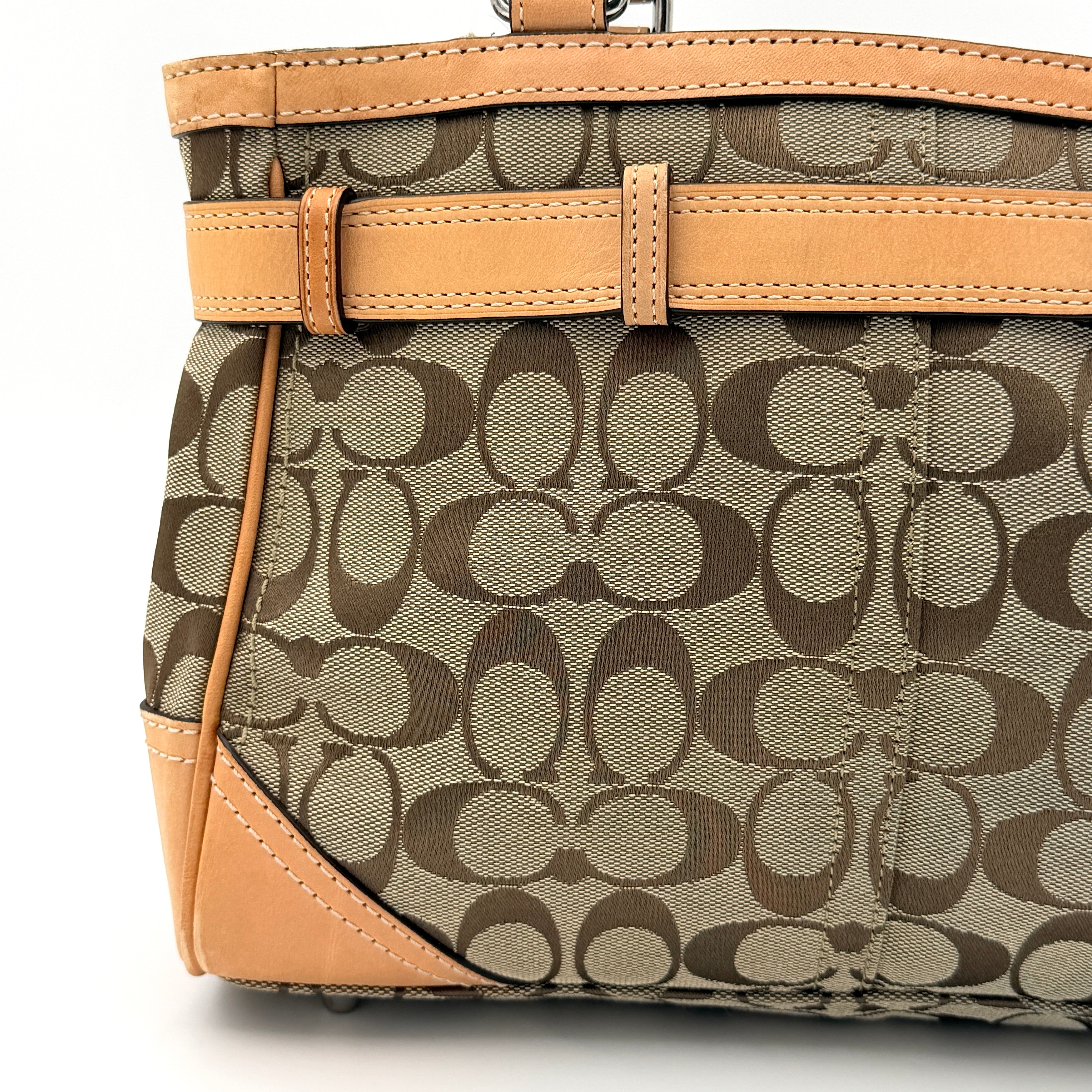 Coach Signature Hampton Clip Shoulder Bag in beige and brown jacquard canvas with leather trim and silver-tone hardware, displayed upright with twin handles.