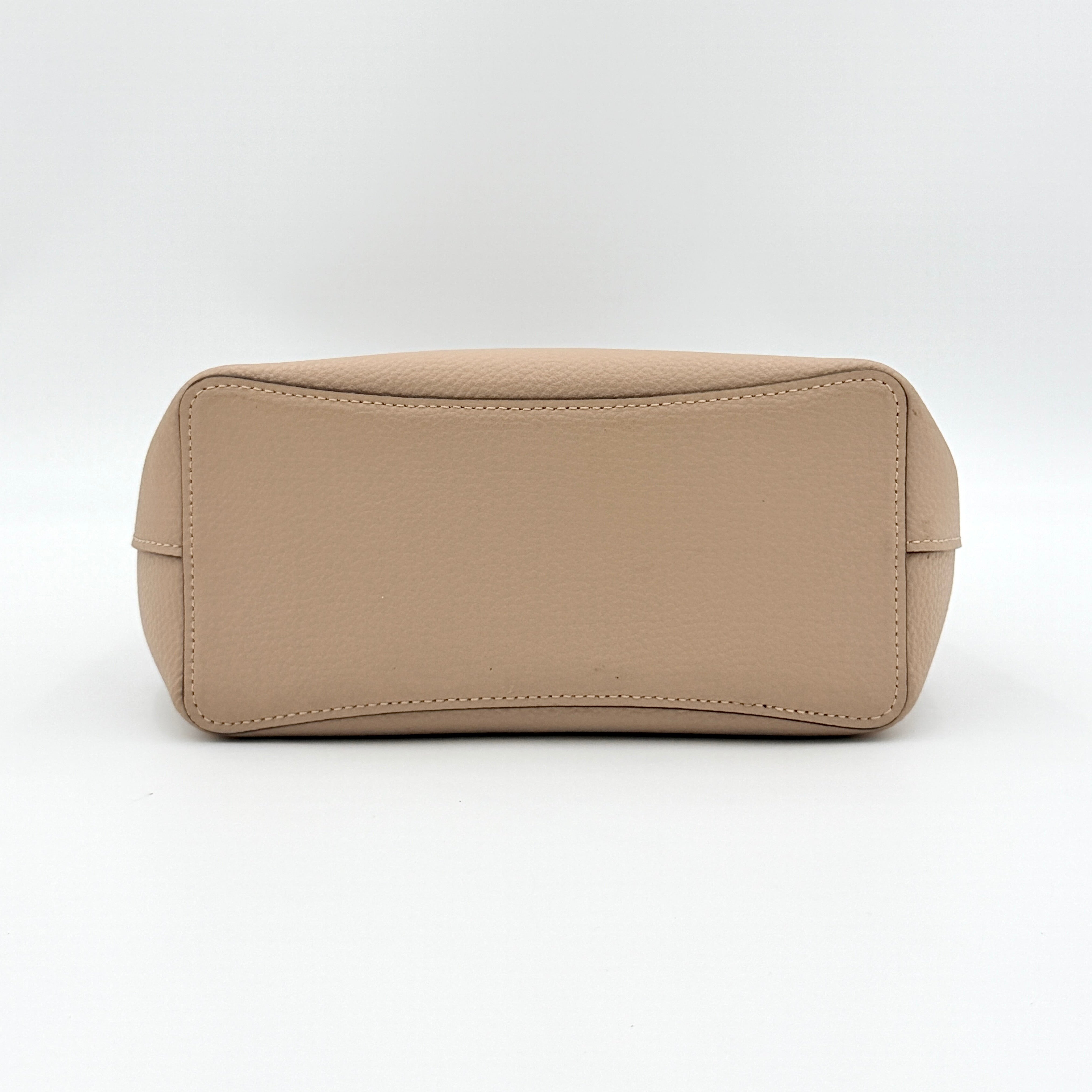 Coach Town Bucket Bag in taupe pebbled leather with gold-tone hardware and Coach hangtag, shown against a white background.