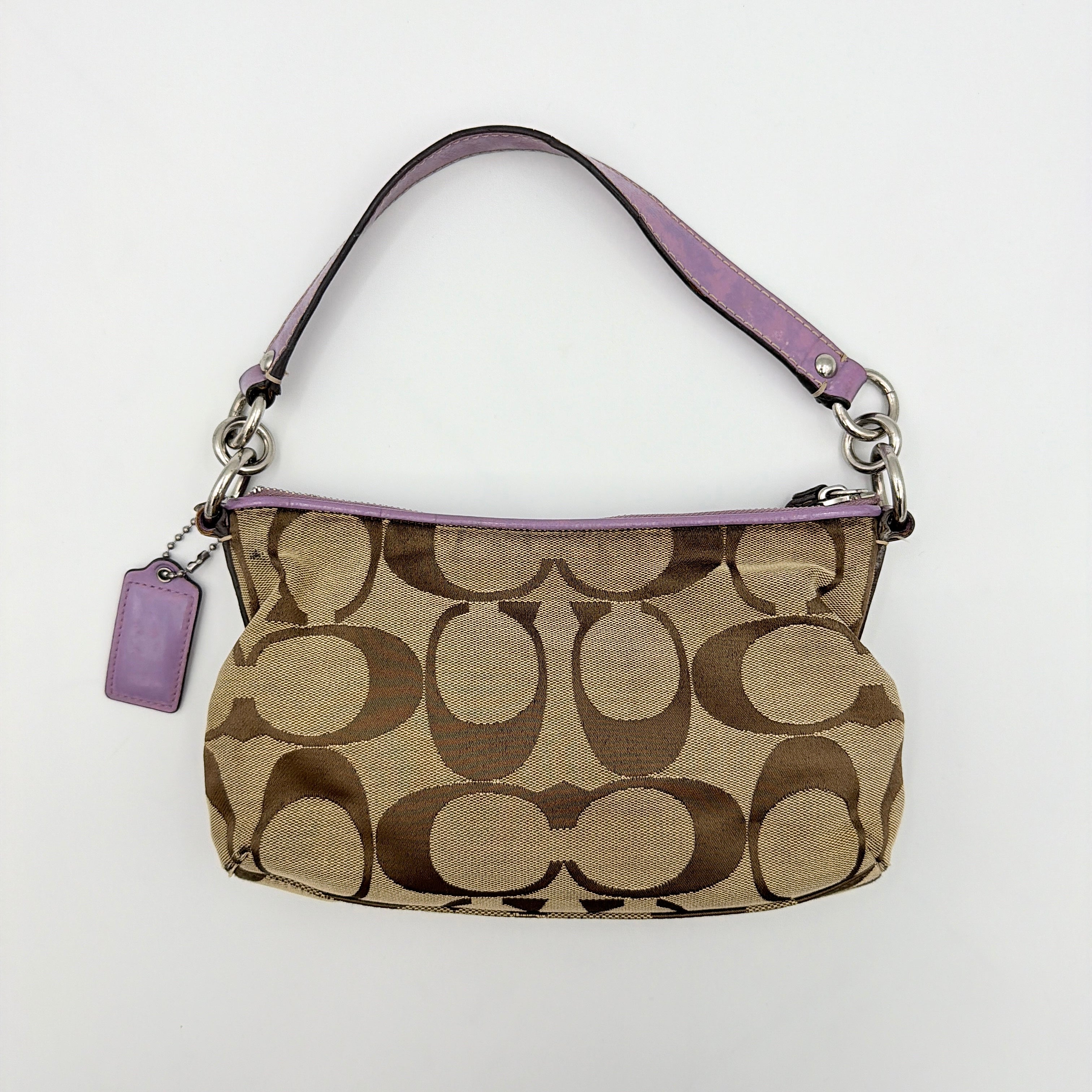 Coach 2Way Signature Shoulder Bag in beige jacquard with purple leather accents and silver hardware, shown with both short handle and detachable long strap.