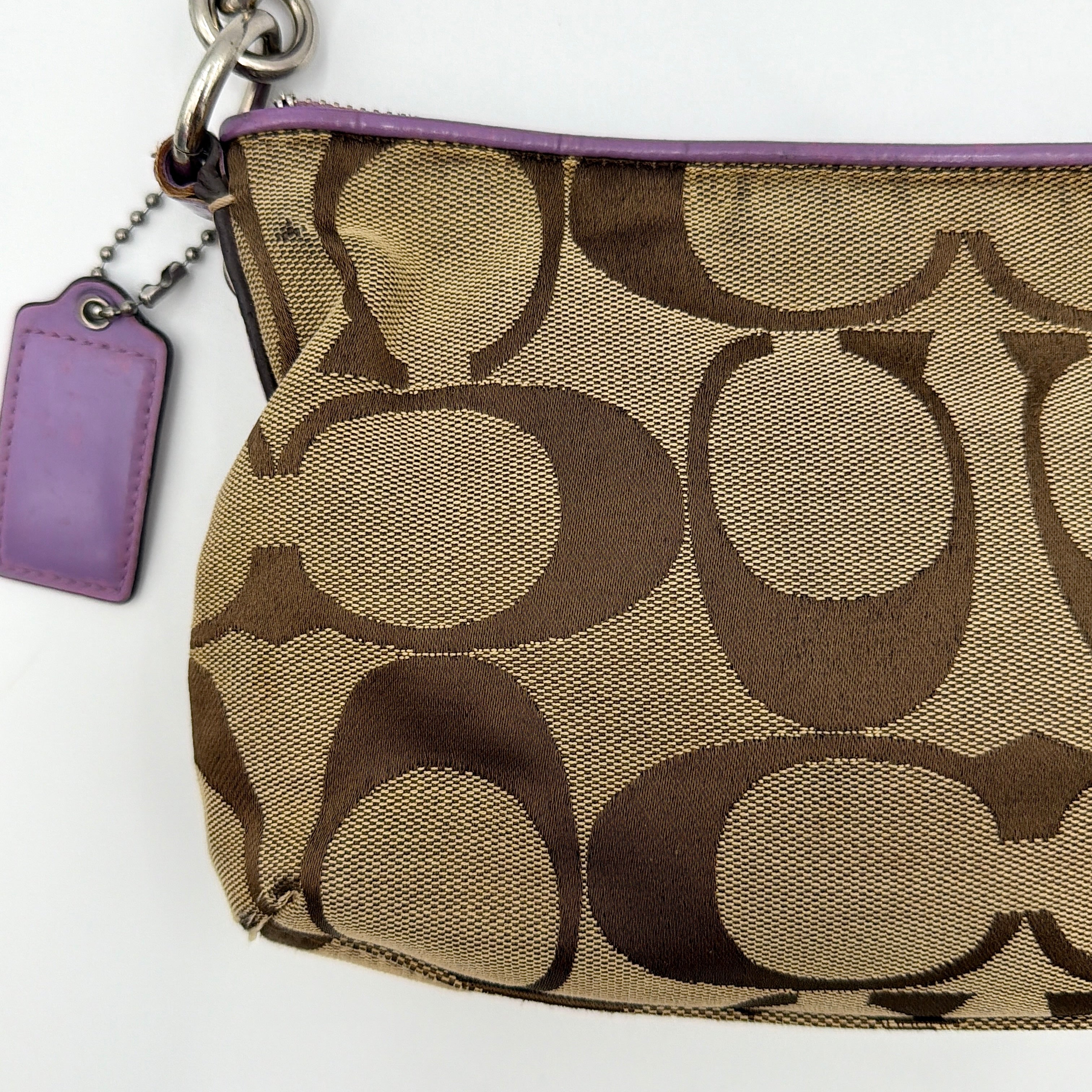 Coach 2Way Signature Shoulder Bag in beige jacquard with purple leather accents and silver hardware, shown with both short handle and detachable long strap.