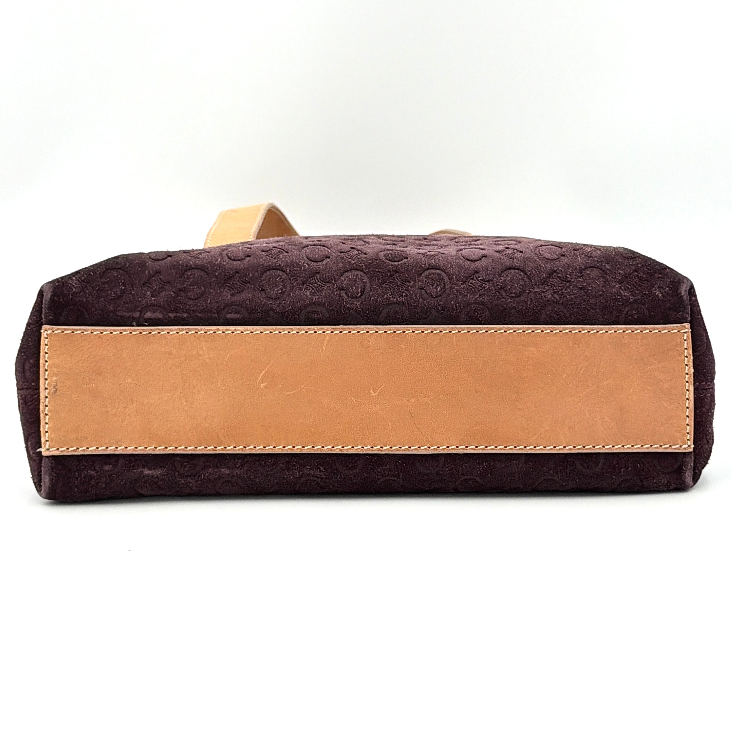 Celine C Macadam Shoulder Bag in rich brown embossed suede with tan leather handles, showcased against a plain background.