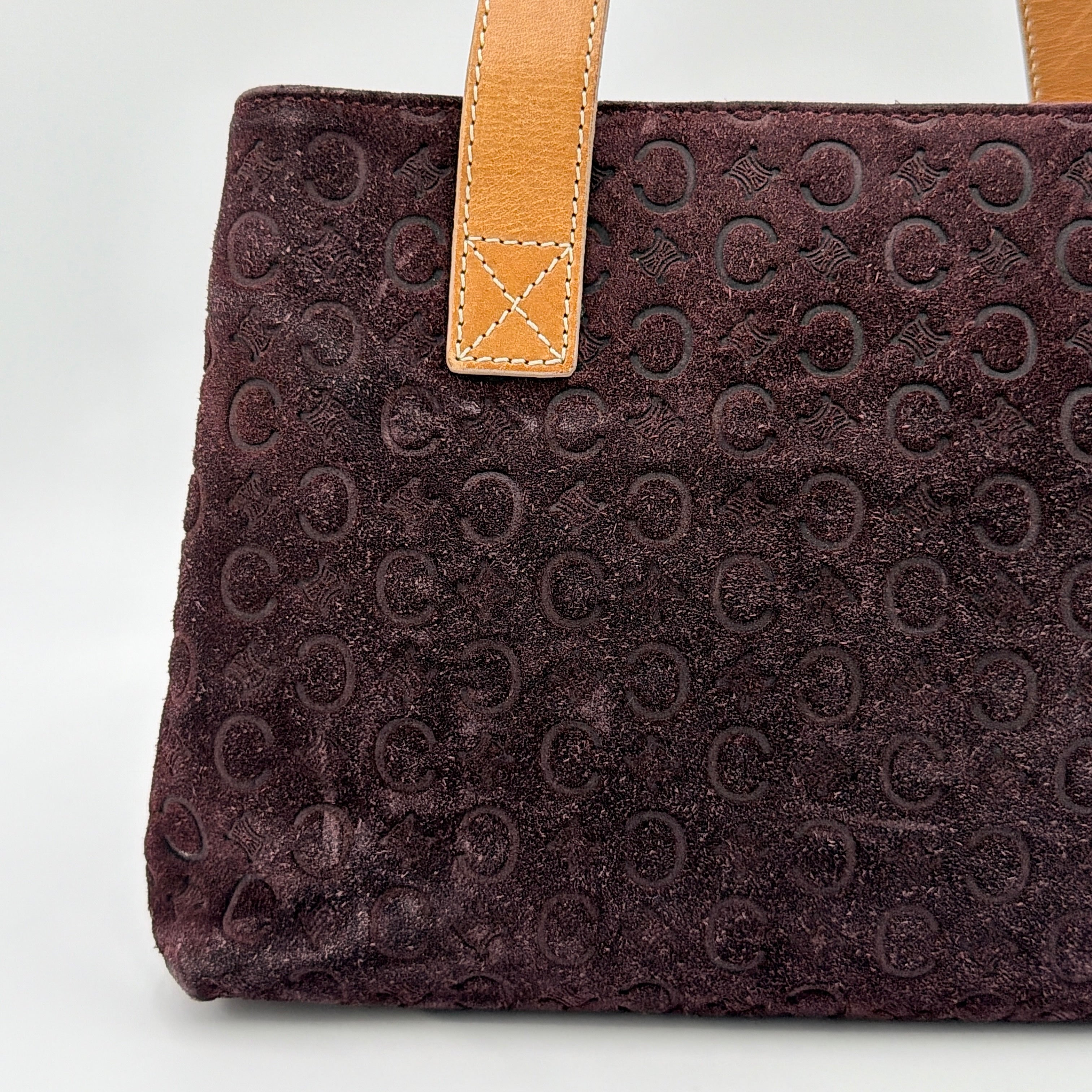 Celine C Macadam Shoulder Bag in rich brown embossed suede with tan leather handles, showcased against a plain background.