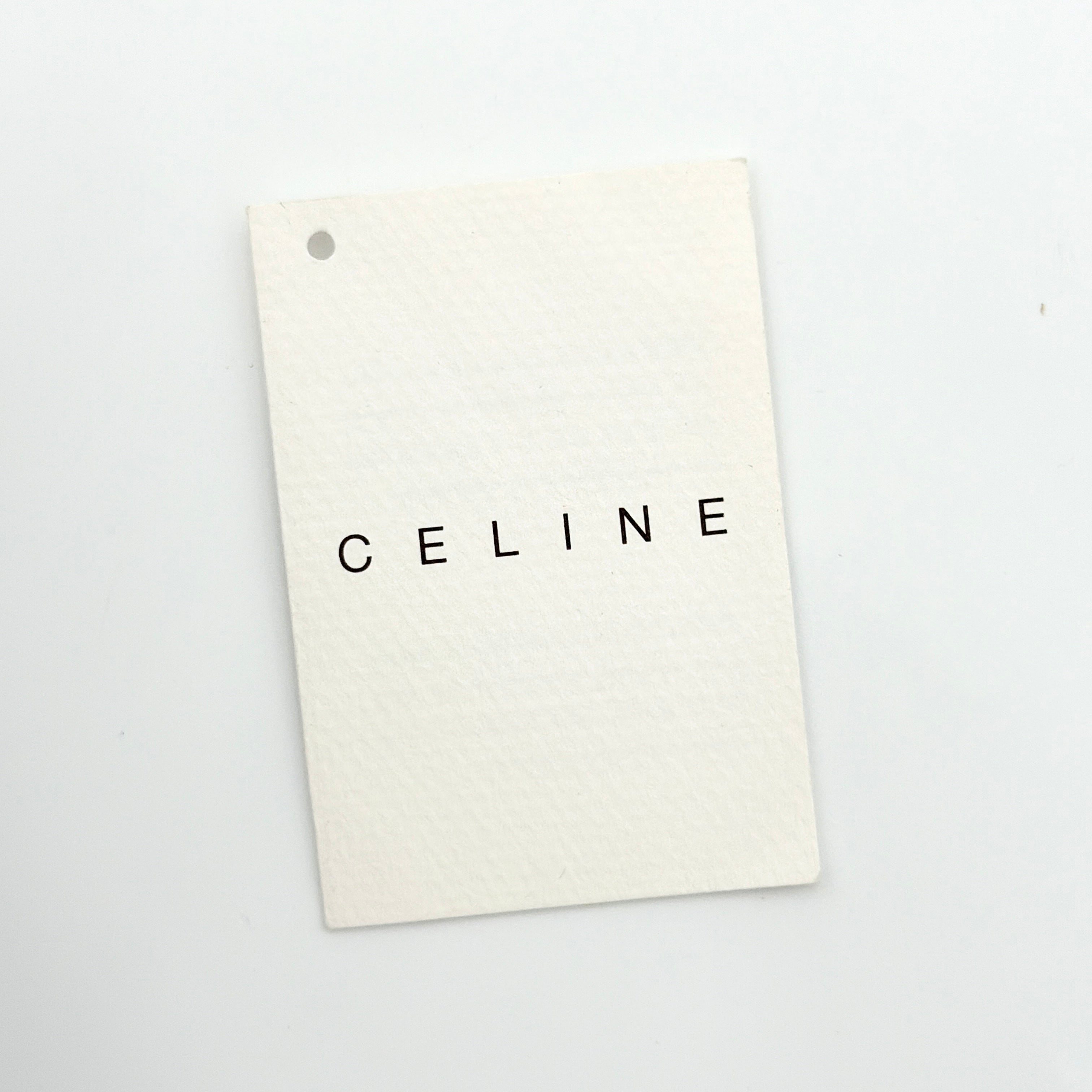 Celine C Macadam Shoulder Bag in rich brown embossed suede with tan leather handles, showcased against a plain background.