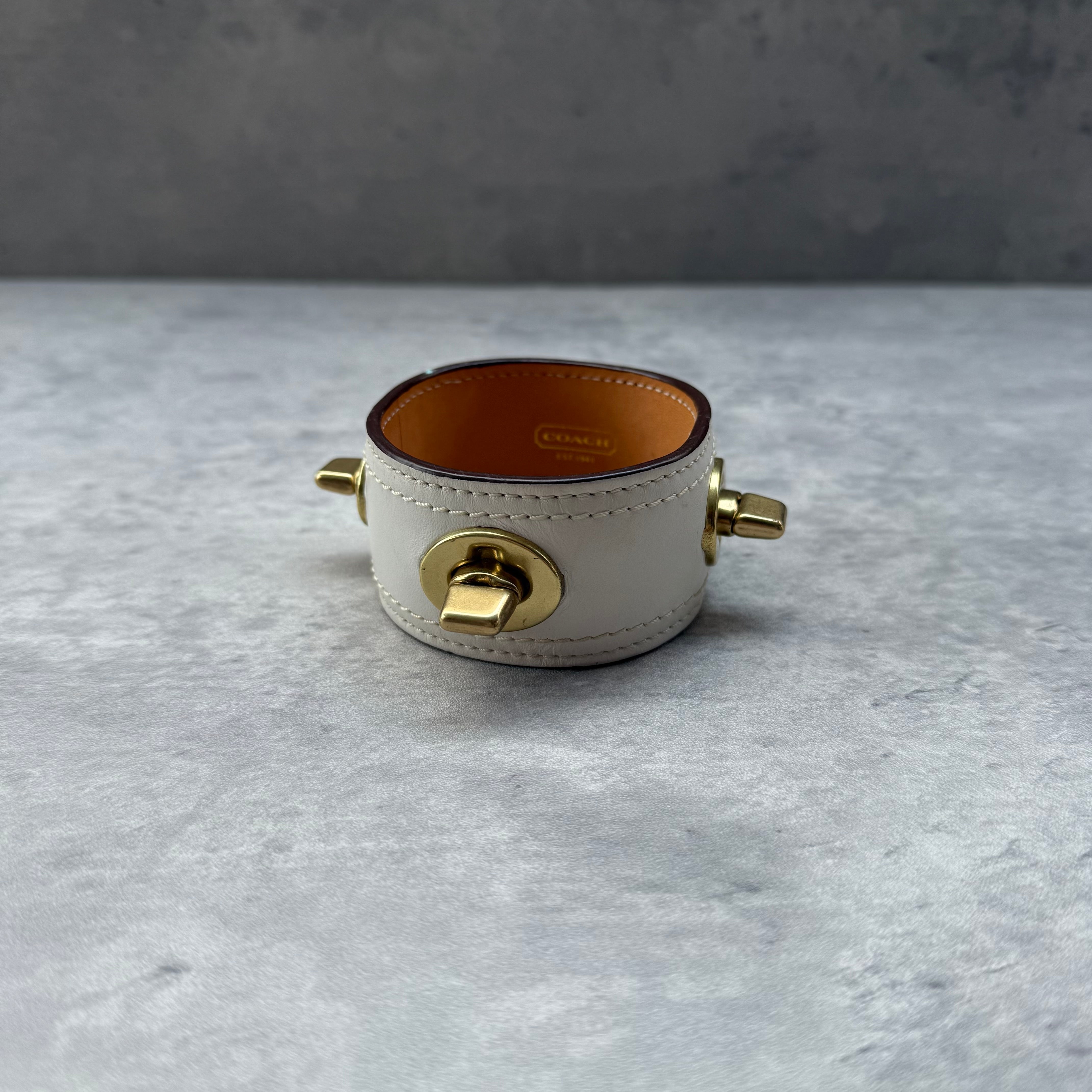 Coach Turnlock Cuff Bracelet White