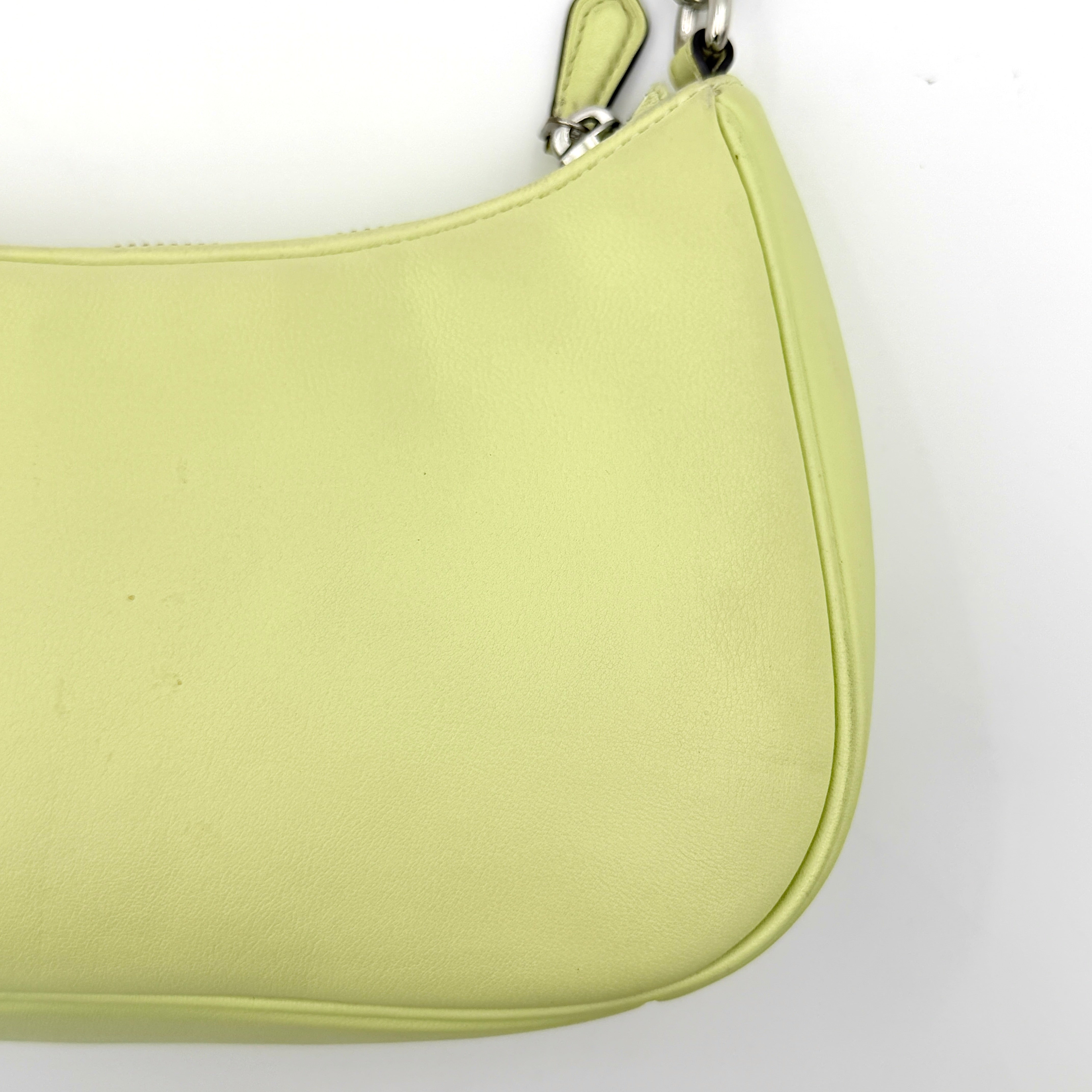 Coach 2Way C Teri Quilted Shoulder Bag in pastel green leather with oversized chain handle and detachable strap, displayed against a clean background.