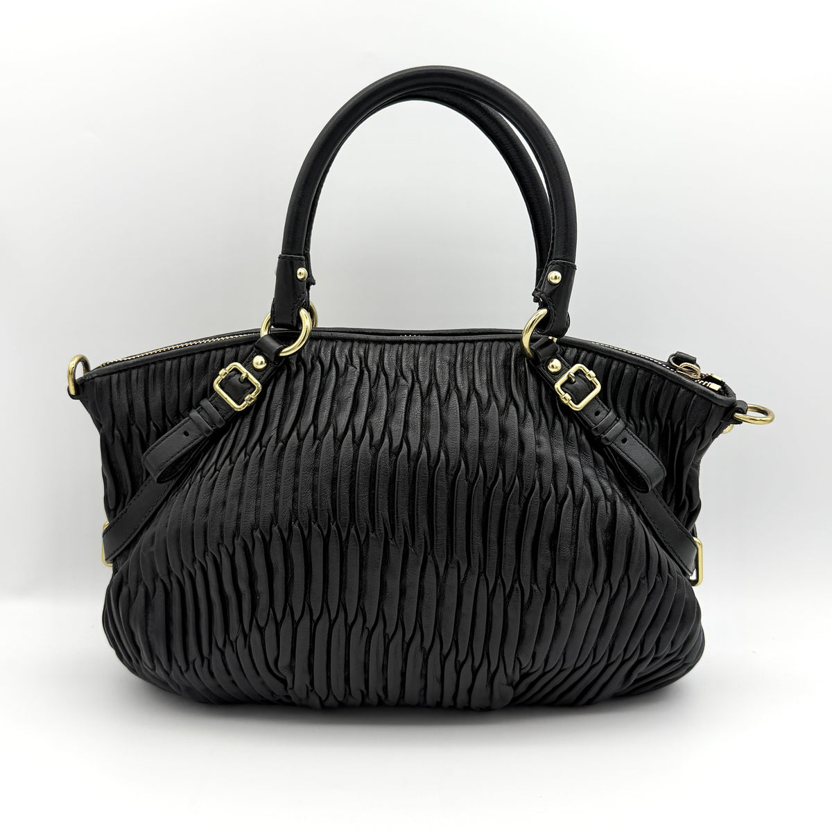 Coach Sophia Madison Pleated Shoulder Bag in black leather with gold hardware and detachable strap.