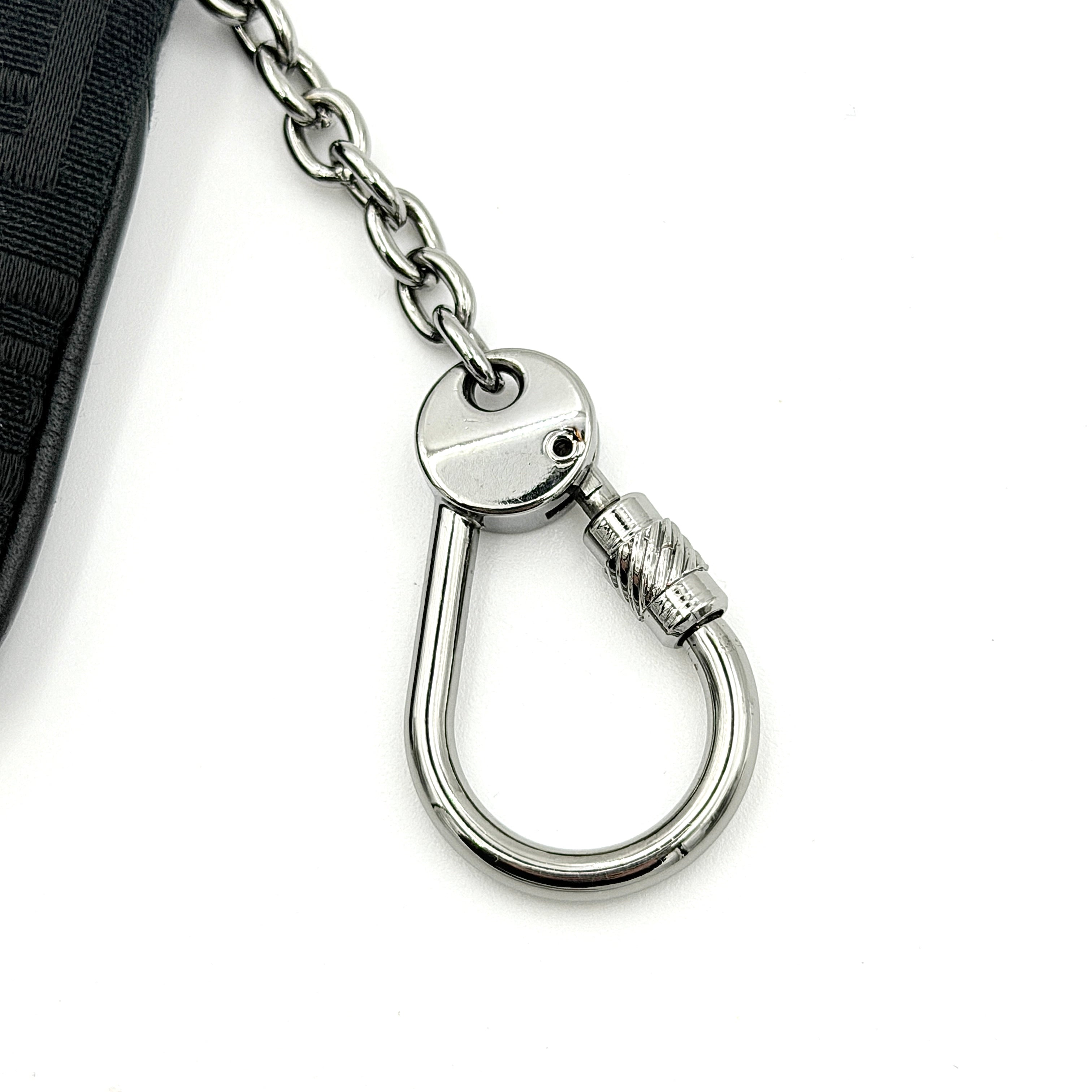 Fendi FF Zucca Coin Purse in black jacquard with iconic monogram pattern, silver-tone chain and carabiner detail.