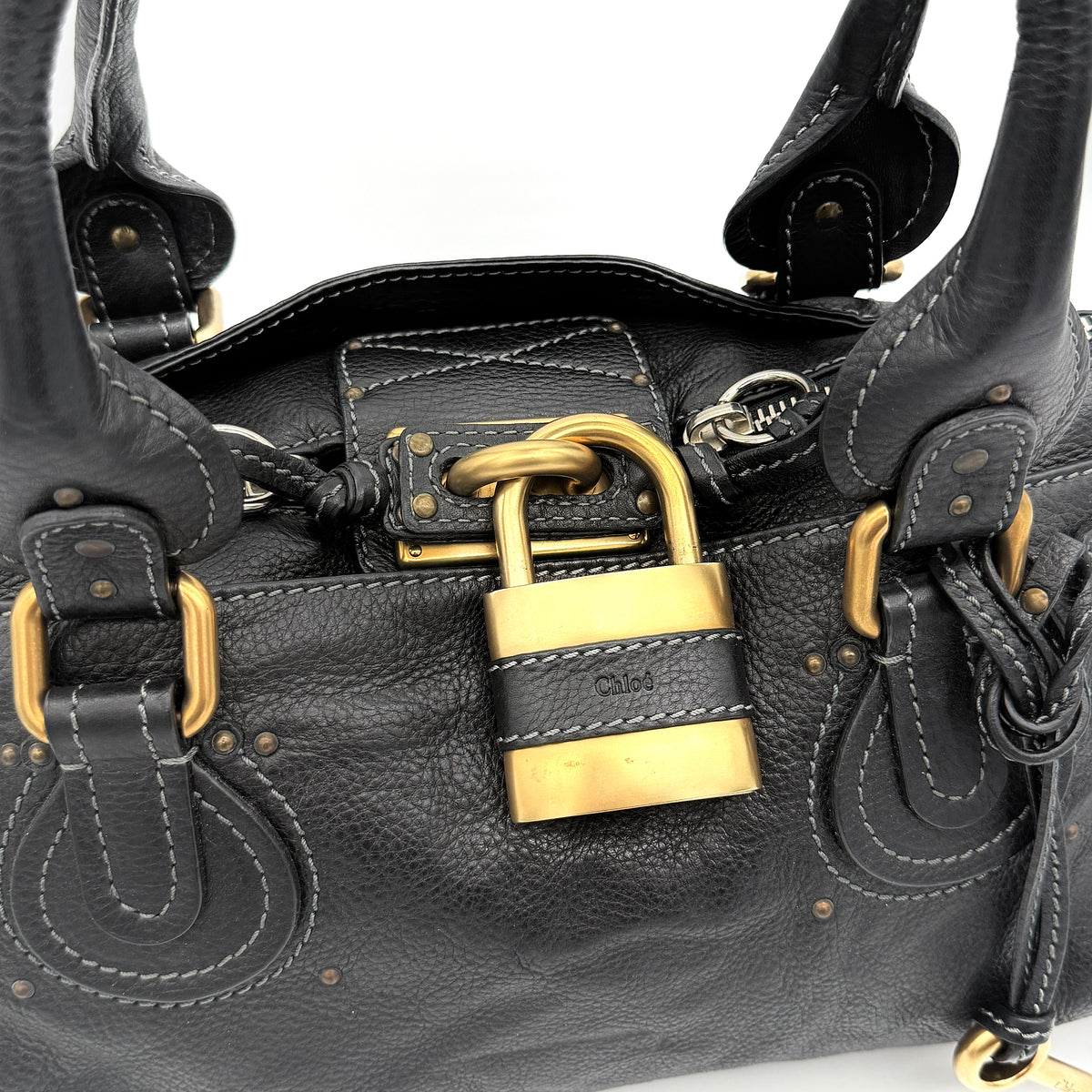 Front view of the Chloe Paddington Shoulder Bag in black leather with gold-tone hardware and signature padlock.