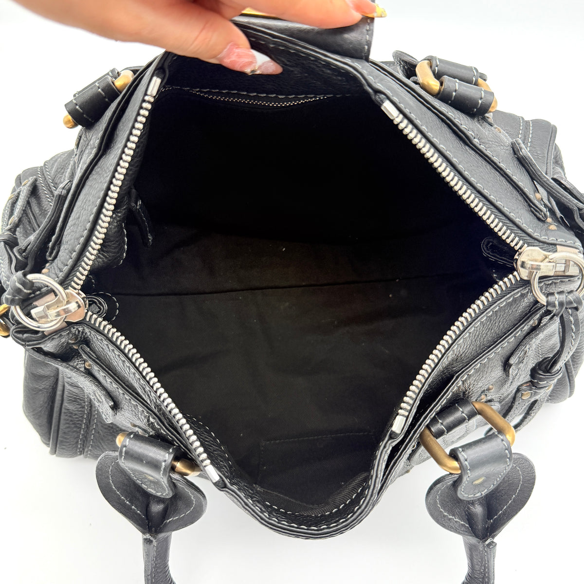 Front view of the Chloe Paddington Shoulder Bag in black leather with gold-tone hardware and signature padlock.