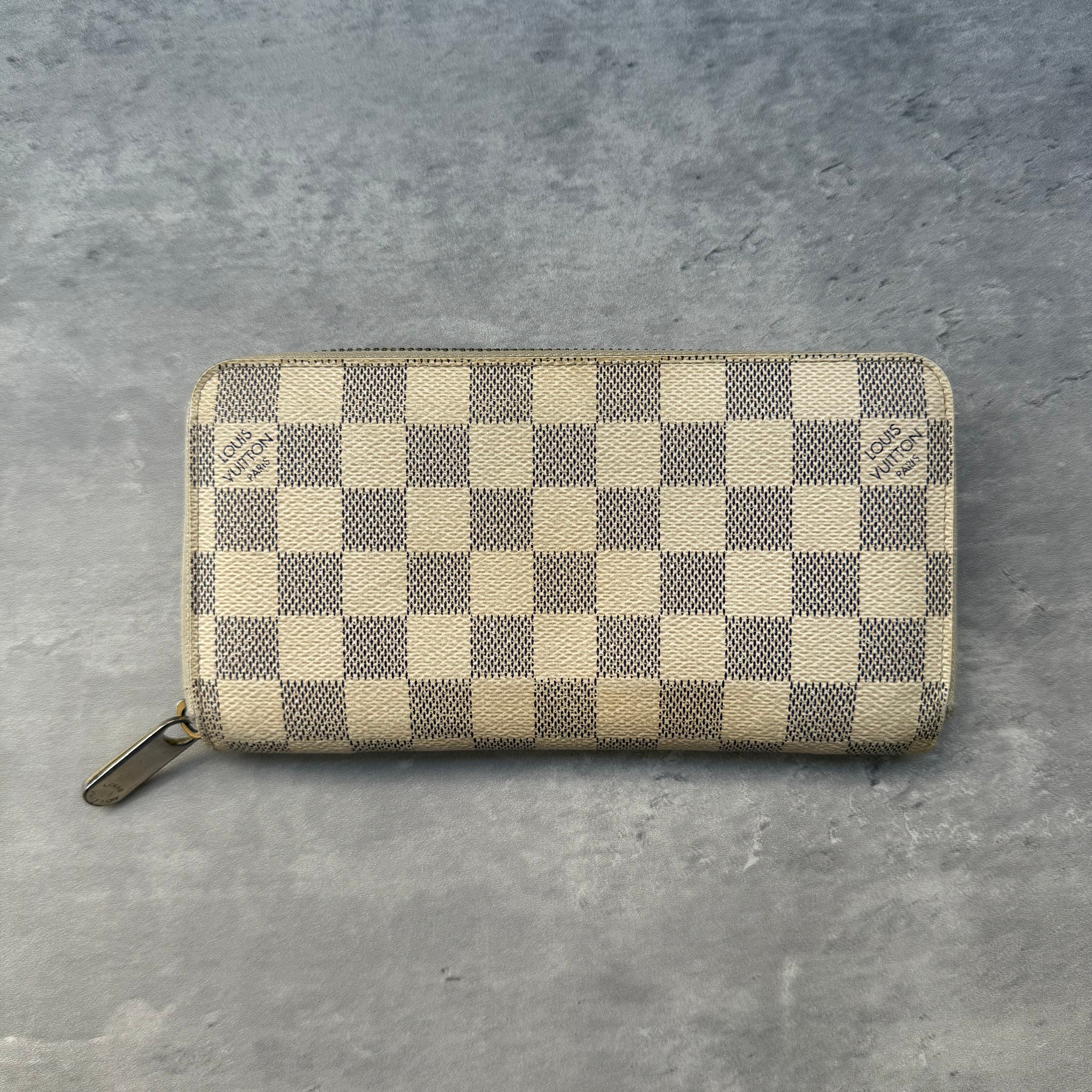 Louis Vuitton Damier Azur Zippy Organizer Wallet in coated canvas with gold-tone hardware, featuring card slots, zip coin pocket, and compartments – Pre-loved.