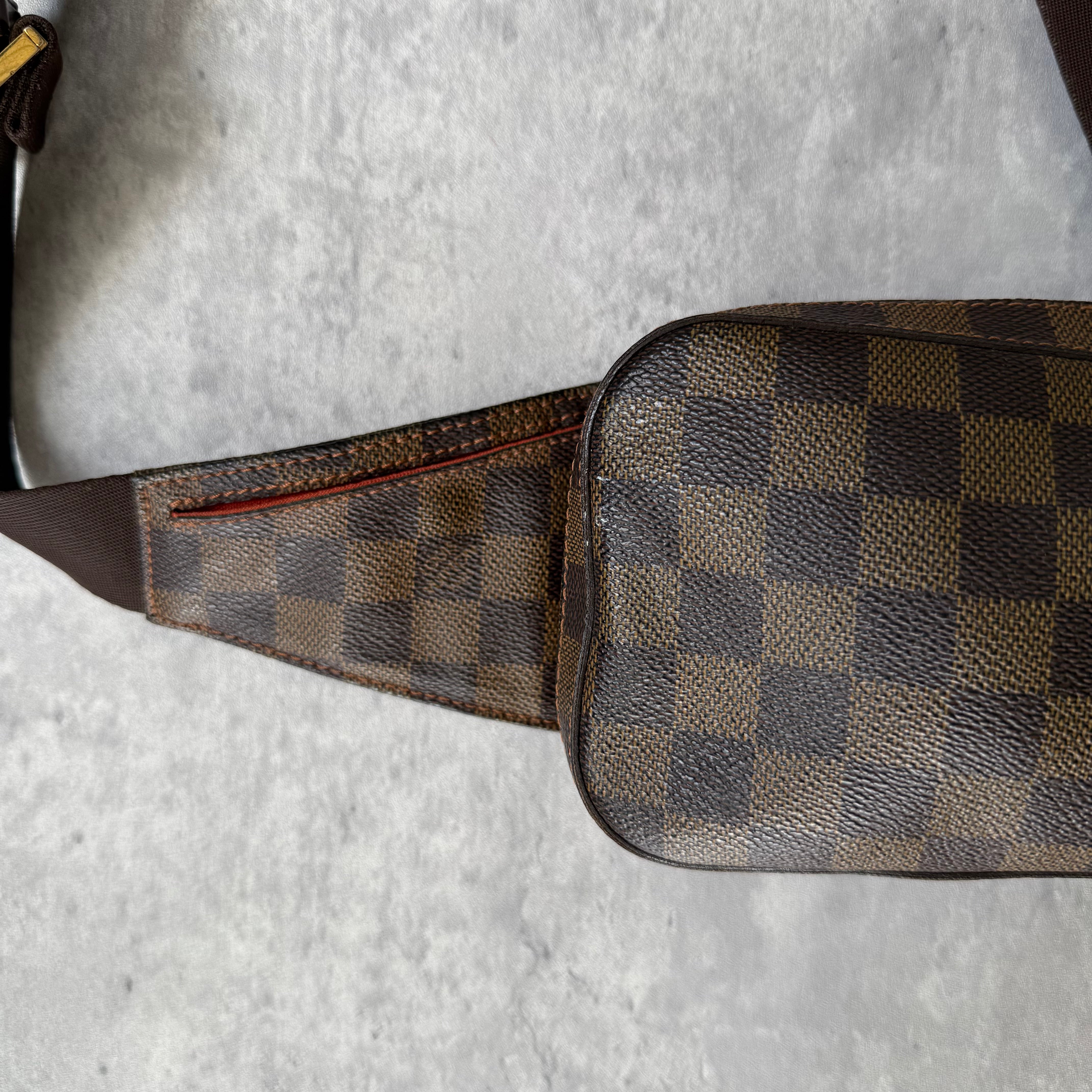 Louis Vuitton Geronimos Bag in brown Damier Ebene canvas with adjustable strap, red interior, and zip closure.