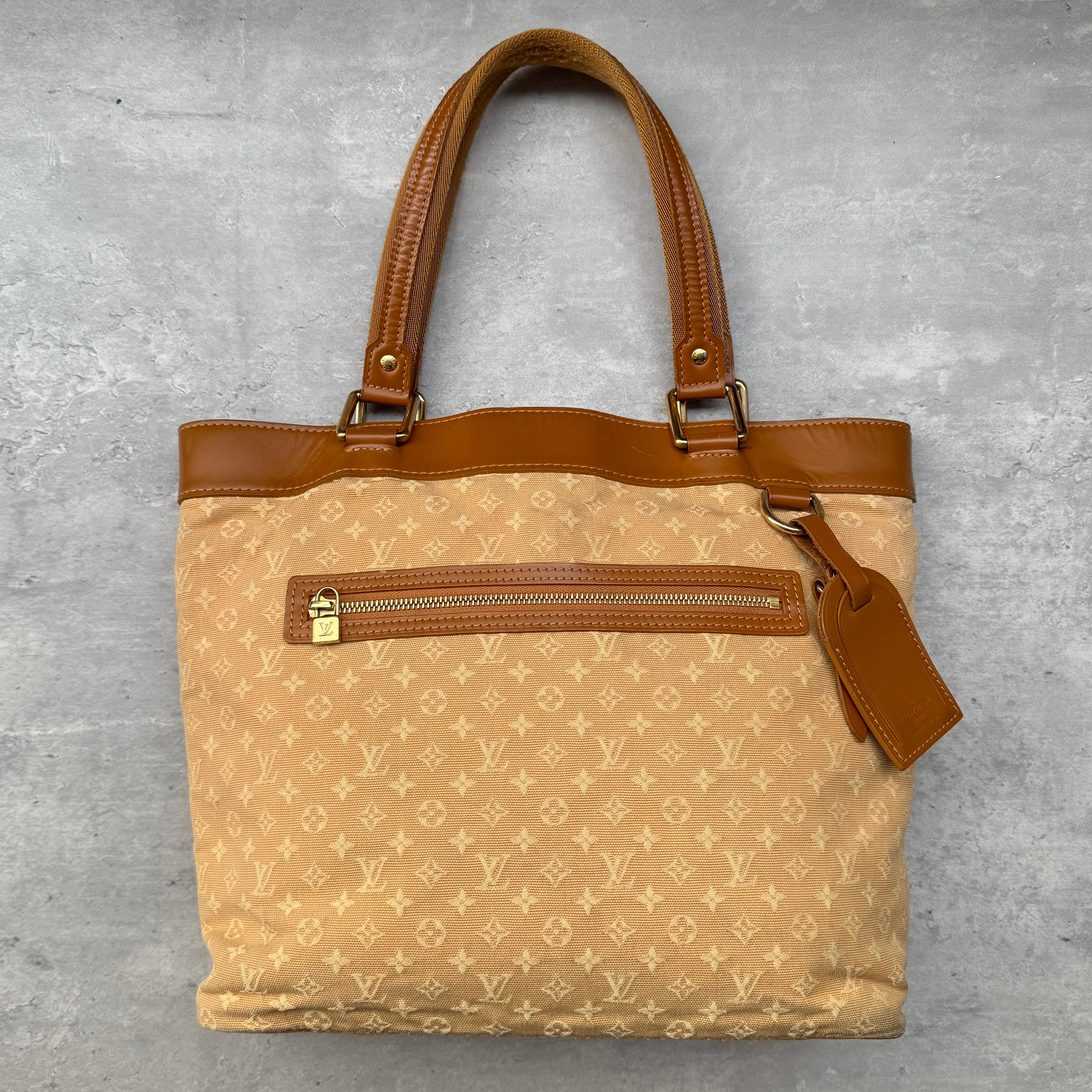 Louis Vuitton Mini Lin Monogram Lucille GM Tote Bag in Beige/Caramel with gold-tone hardware and leather trim