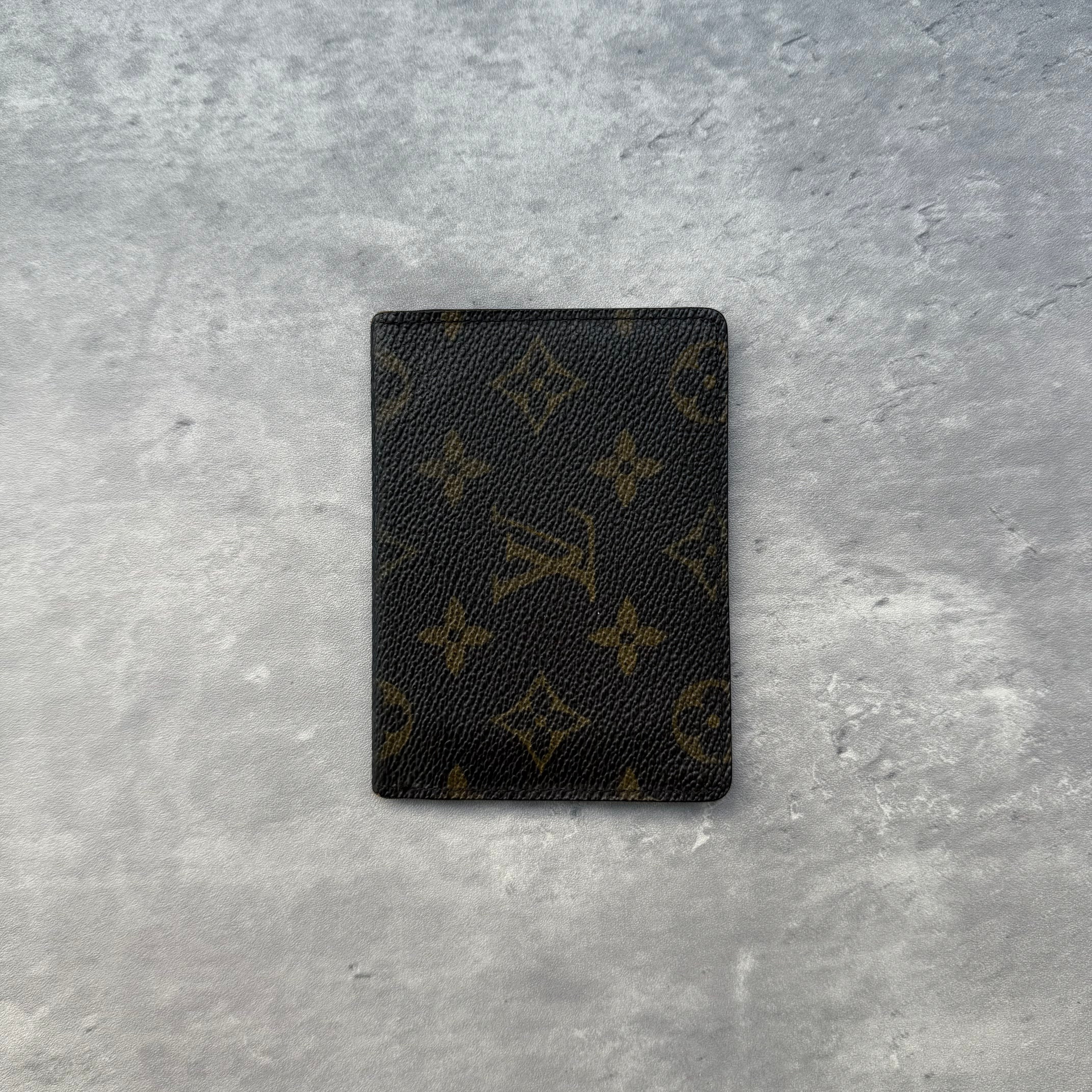 Louis Vuitton Monogram ID Card Holder in brown coated canvas with dual transparent ID windows, slim bifold design.