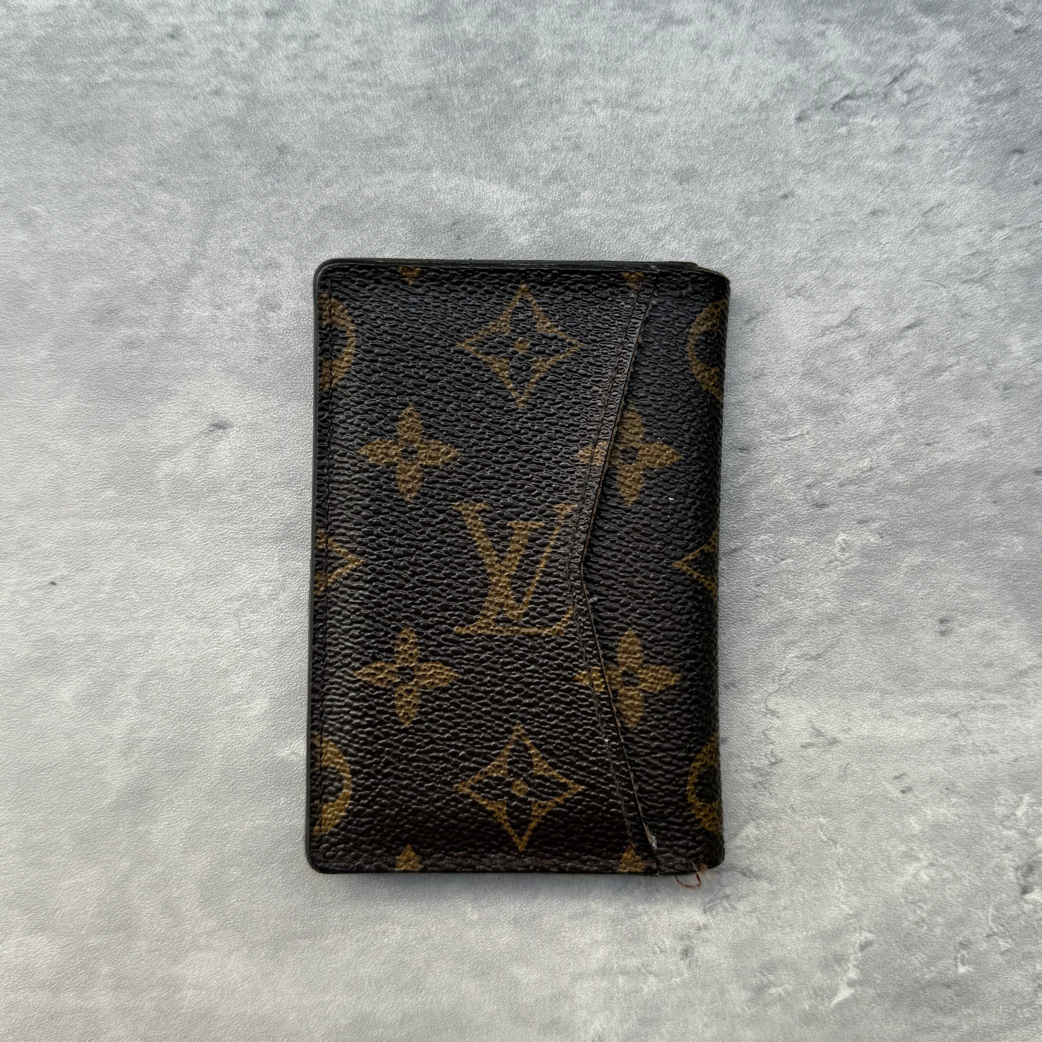 Louis Vuitton Monogram Pocket Organizer Cardholder Brown, crafted from classic monogram coated canvas with brown leather interior and multiple card slots.