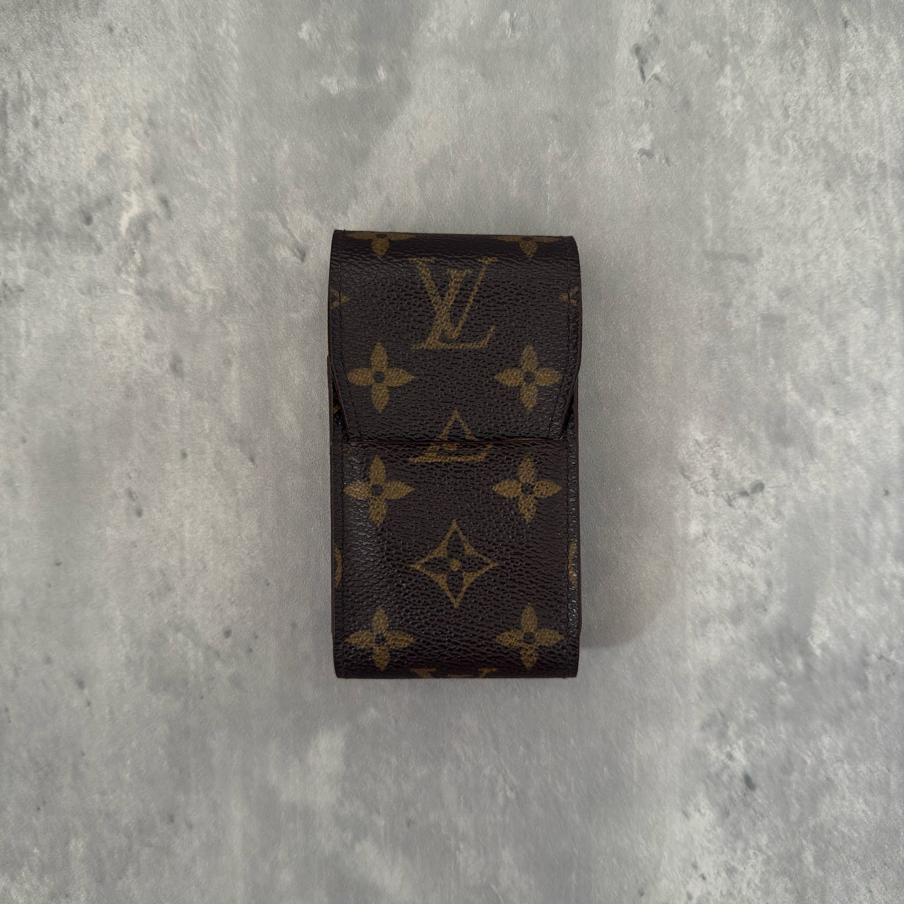 Louis Vuitton Vintage Monogram Cigarette Case in brown coated canvas with signature monogram pattern and leather-lined interior.