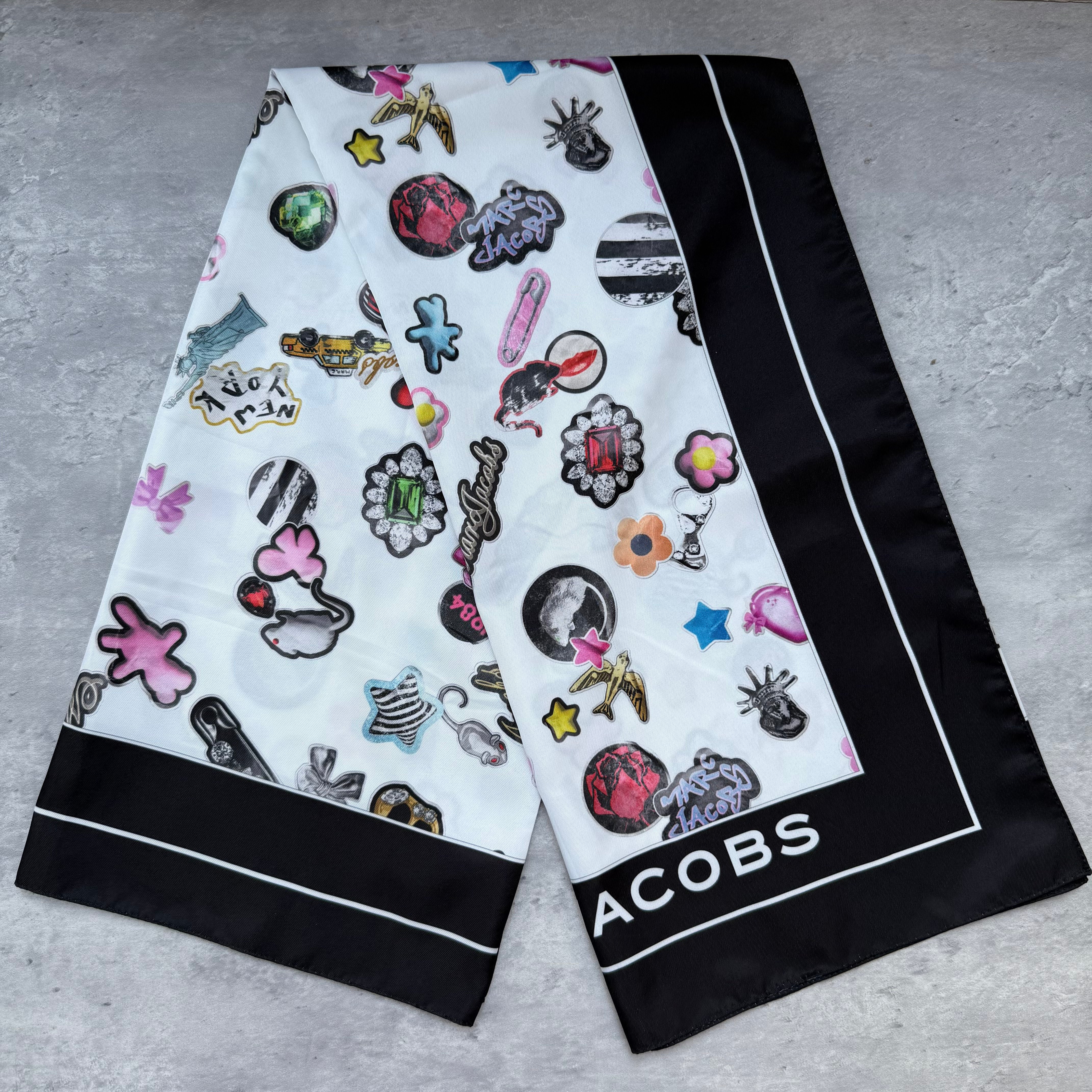 Marc Jacobs Patterned Silk Scarf in multicolor graphic design with black silk border.