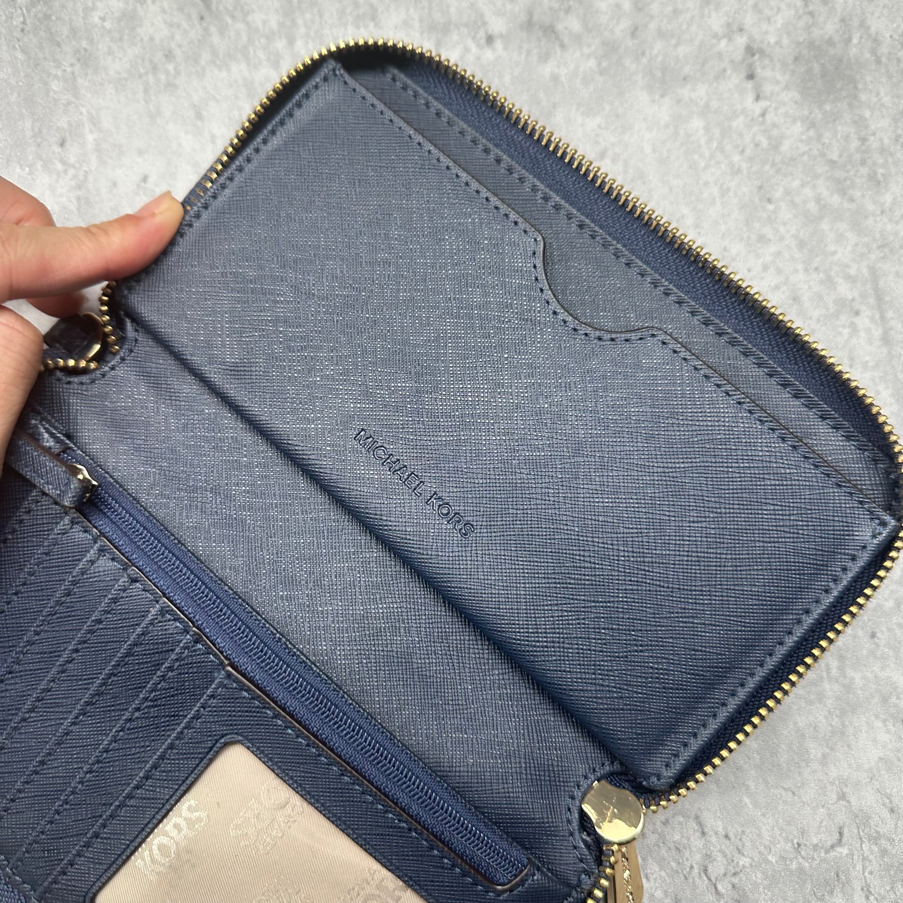 Michael Kors Fulton Leather Zip Wallet, pebbled texture with gold MK logo and zip closure