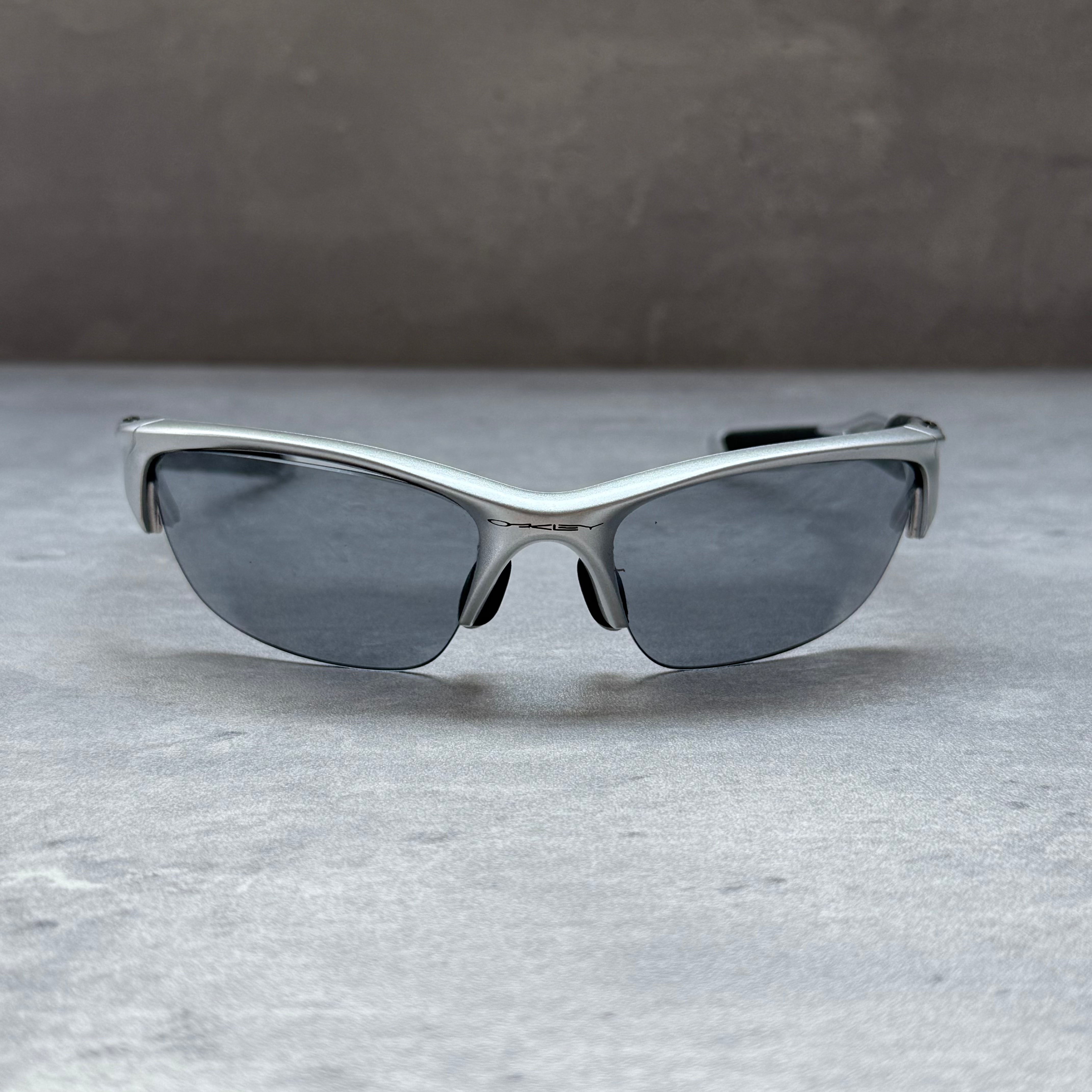 Oakley Half Jacket 2.0 Sunglasses in black and white frame with dark wraparound lenses, pre-loved.