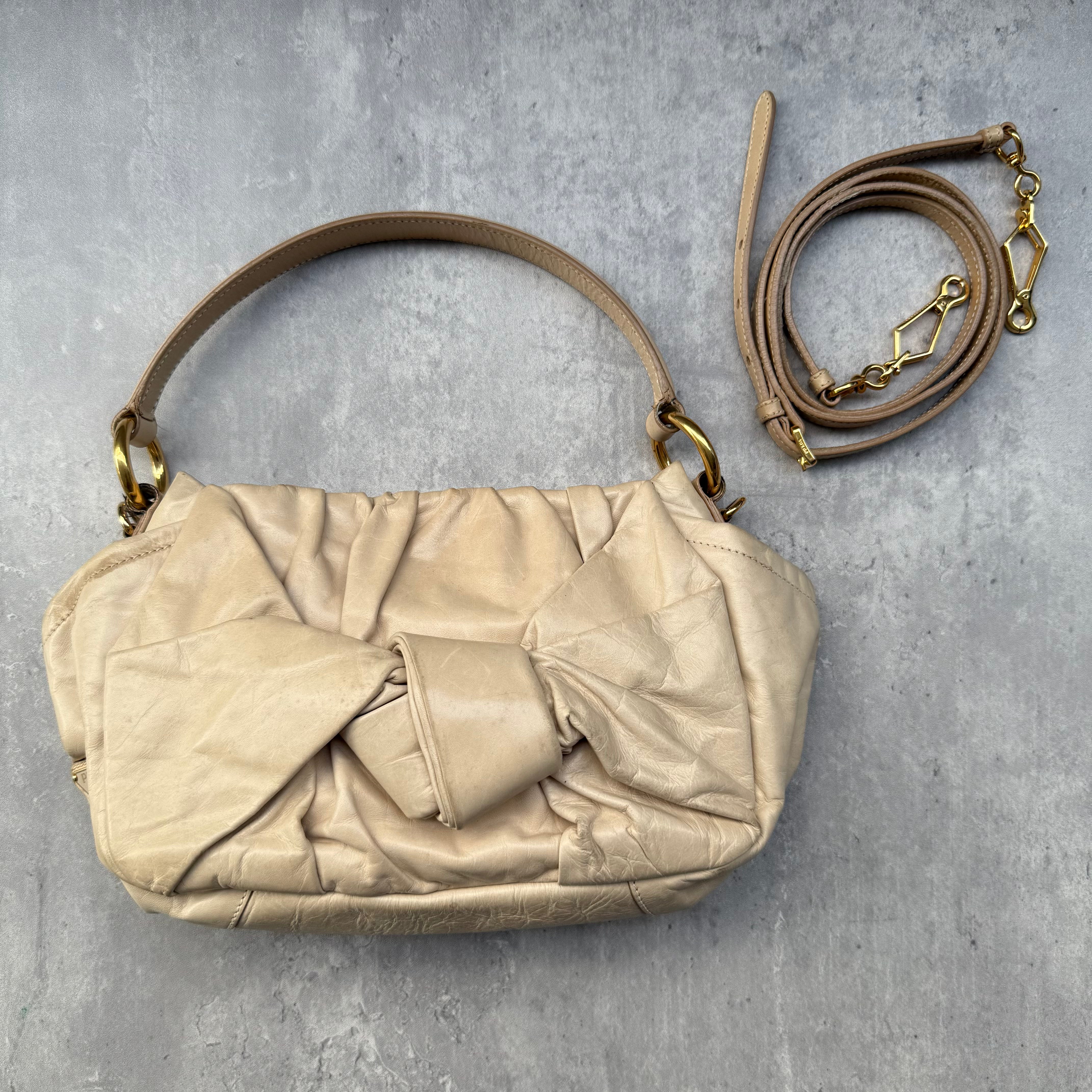 Prada Talco Leather Dressy New Look Shoulder Bag in cream leather with pleated detailing, gold-tone hardware, and detachable strap.