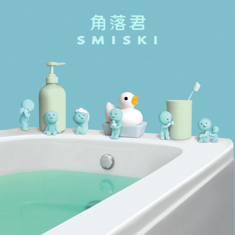 Smiski collectible figure, glow-in-the-dark mini character in quirky poses, perfect for shelves and desks.