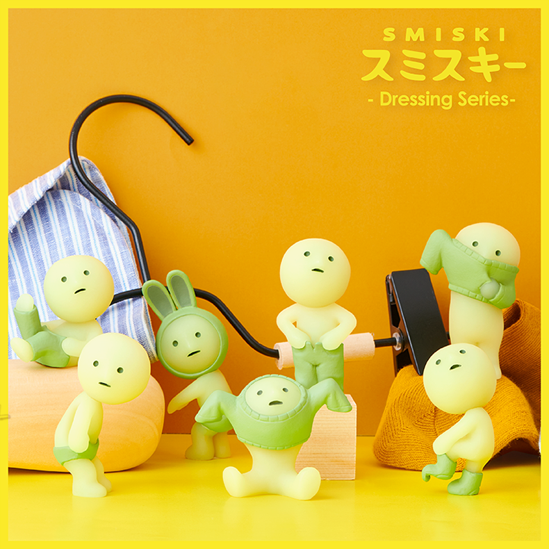 Smiski collectible figure, glow-in-the-dark mini character in quirky poses, perfect for shelves and desks.