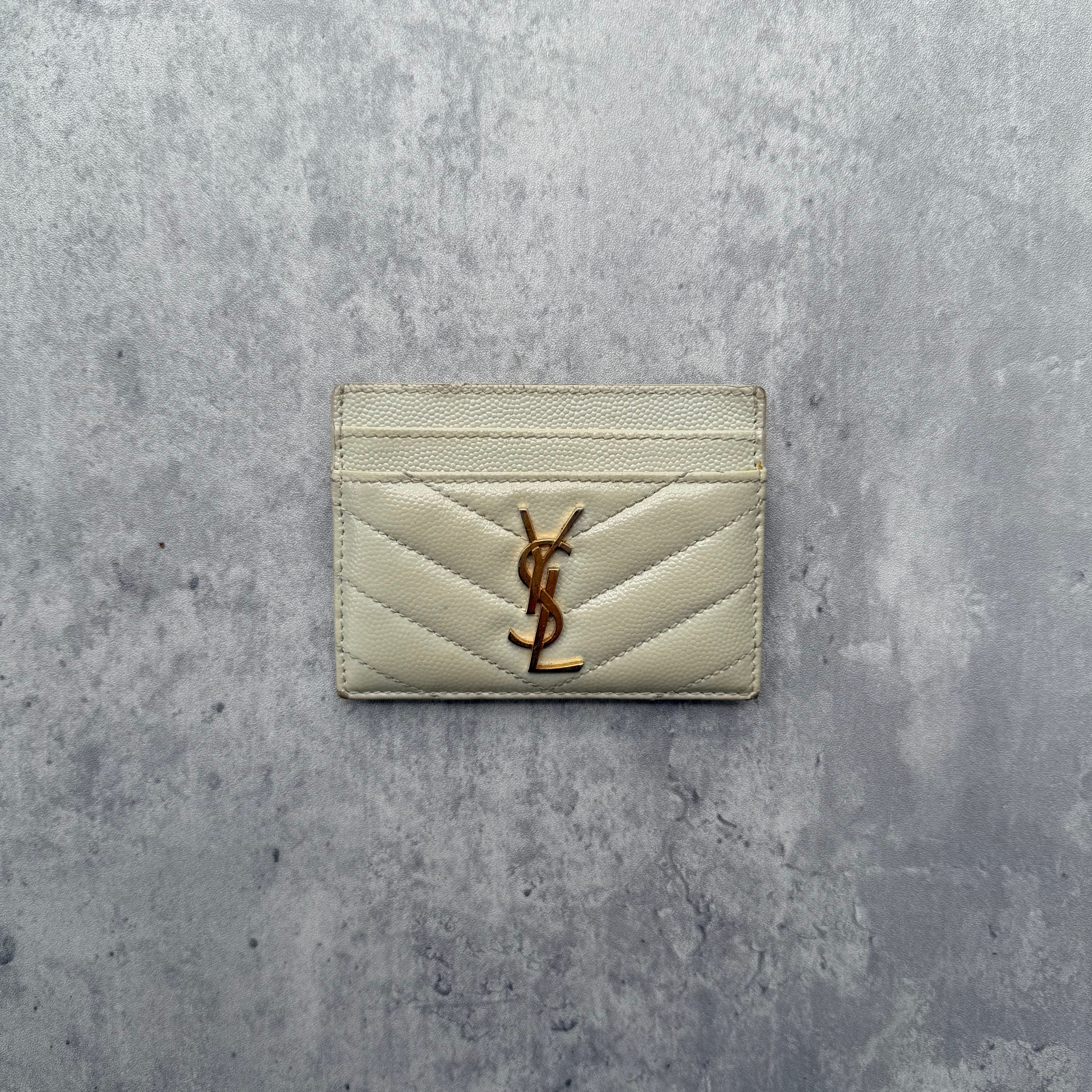 Saint Laurent Cassandre Matelassé Card Case in cream quilted leather with gold YSL logo and multiple card slots.