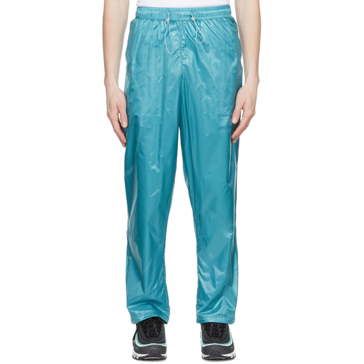 Saul Nash Blue Nylon Trousers with glossy finish, elastic waistband, and relaxed straight-leg cut