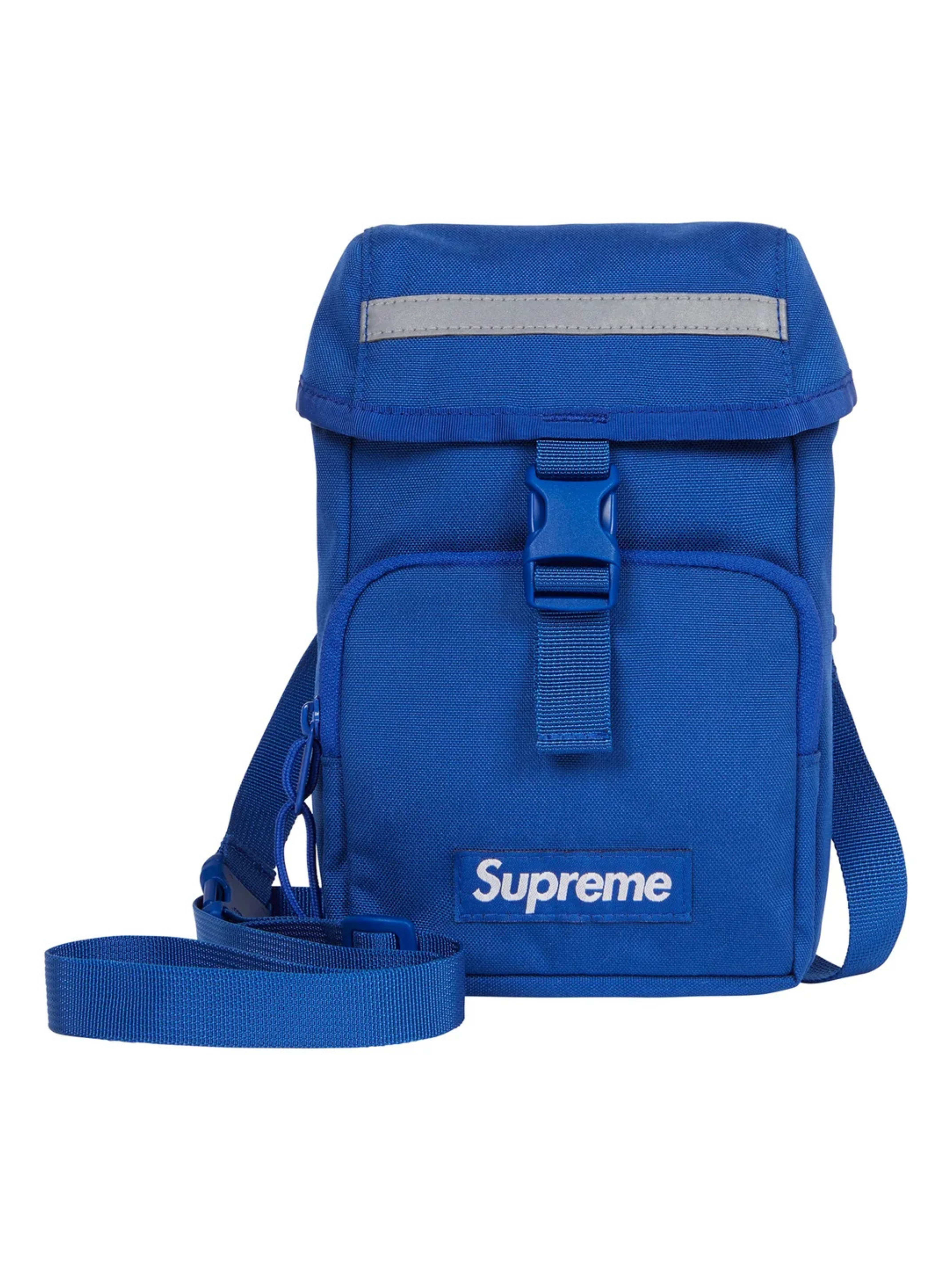 Supreme Camera Bag Blue FW24 in durable Cordura nylon with reflective strip, buckle flap, and bold white logo