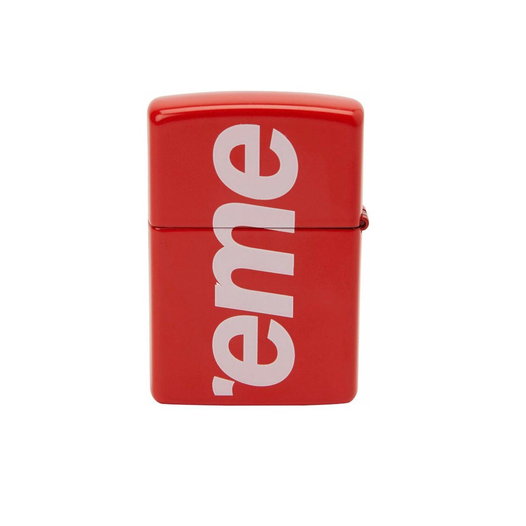 Supreme Logo Zippo Red, featuring a high-gloss metal casing, iconic white Supreme branding, and a classic windproof flip-top design.